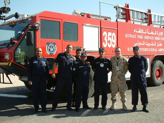 KUWAIT CITY INTERNATIONAL AIRPORT, Kuwait--Air Force Reserve Tech. Sgt. Chad Brown, a safety technician from the 910th Airlift Wing at Youngstown Air Reserve Station, Ohio, has worked with some of the firefighters at the airport here during his Operation Iraqi Freedom deployment.  His deployed assignment is with the 5th Expeditionary Air Mobility Squadron near here.  Courtesy photo.