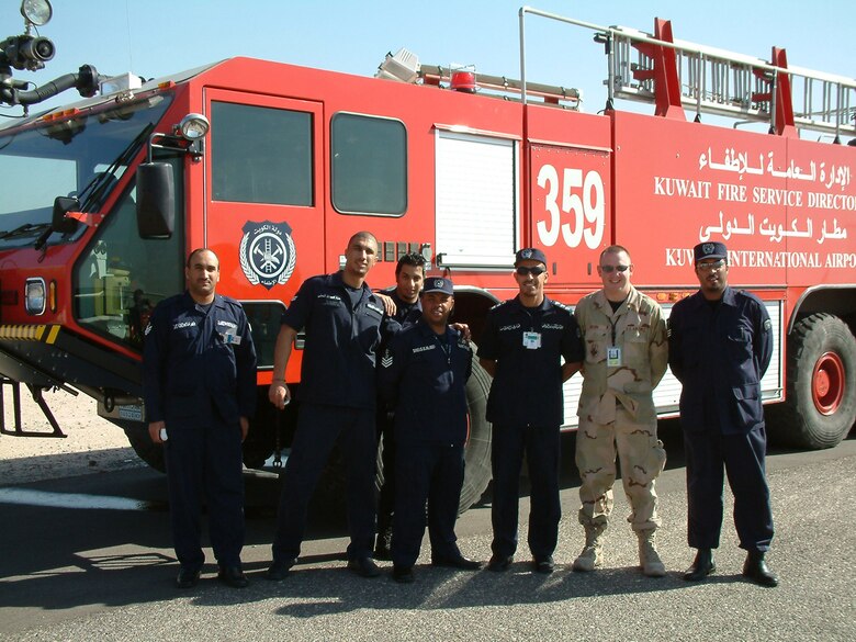 KUWAIT CITY INTERNATIONAL AIRPORT, Kuwait--Air Force Reserve Tech. Sgt. Chad Brown, a safety technician from the 910th Airlift Wing at Youngstown Air Reserve Station, Ohio, has worked with some of the firefighters at the airport here during his Operation Iraqi Freedom deployment.  His deployed assignment is with the 5th Expeditionary Air Mobility Squadron near here.  Courtesy photo.