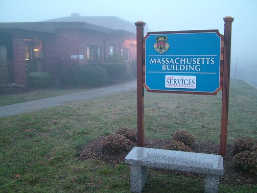 WESTOVER AIR RESERVE BASE, Mass. -- Early morning fog blankets The Flyers Inn, billeting office and the new signs that display the New England states and New York. The Fog is caused by the warmer air coming in contact with the much cooler ground. This December has been uncommonly warm with a high today of 57 degrees but was even higher in the El Nino year of 1998 when the high for the month was 74 degrees. (U.S. Air Force photo by Master Sgt. W.C. Pope) 