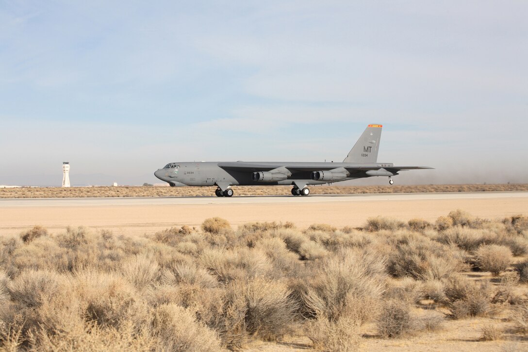 A B-52 Stratofortress accelerates down the runway Dec. 15, 2006, at Edwards Air Force Base, Calif., during take-off for a flight-test mission using a blend of synthetic fuel and JP-8 in all eight engines. This is the first time a "Buff" has flown using a synfuel-blend as the only fuel on board.  In September, the Air Force successfully flew a B-52 with two-engines using the synfuel-blend. The B-52 test flights at Edwards are the initial steps in the Air Force process to test and certify a synthetic blend of fuel for its aviation fleet.  (Photo by Jet Fabara)