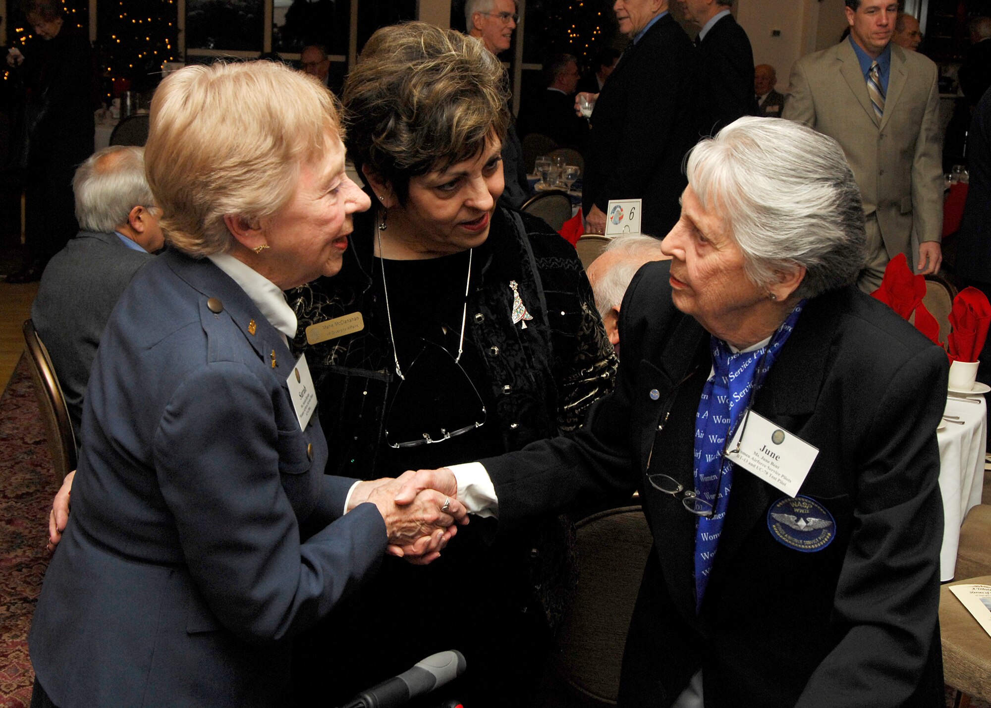 Sara Hayden, Marie McClanahan and June Bent mingle during the evening’s social hour. Ms. Hayden and Ms. Bent were members of the Women Airforce Service Pilots during World War II. (US Air Force Photo by Mark Wyatt)