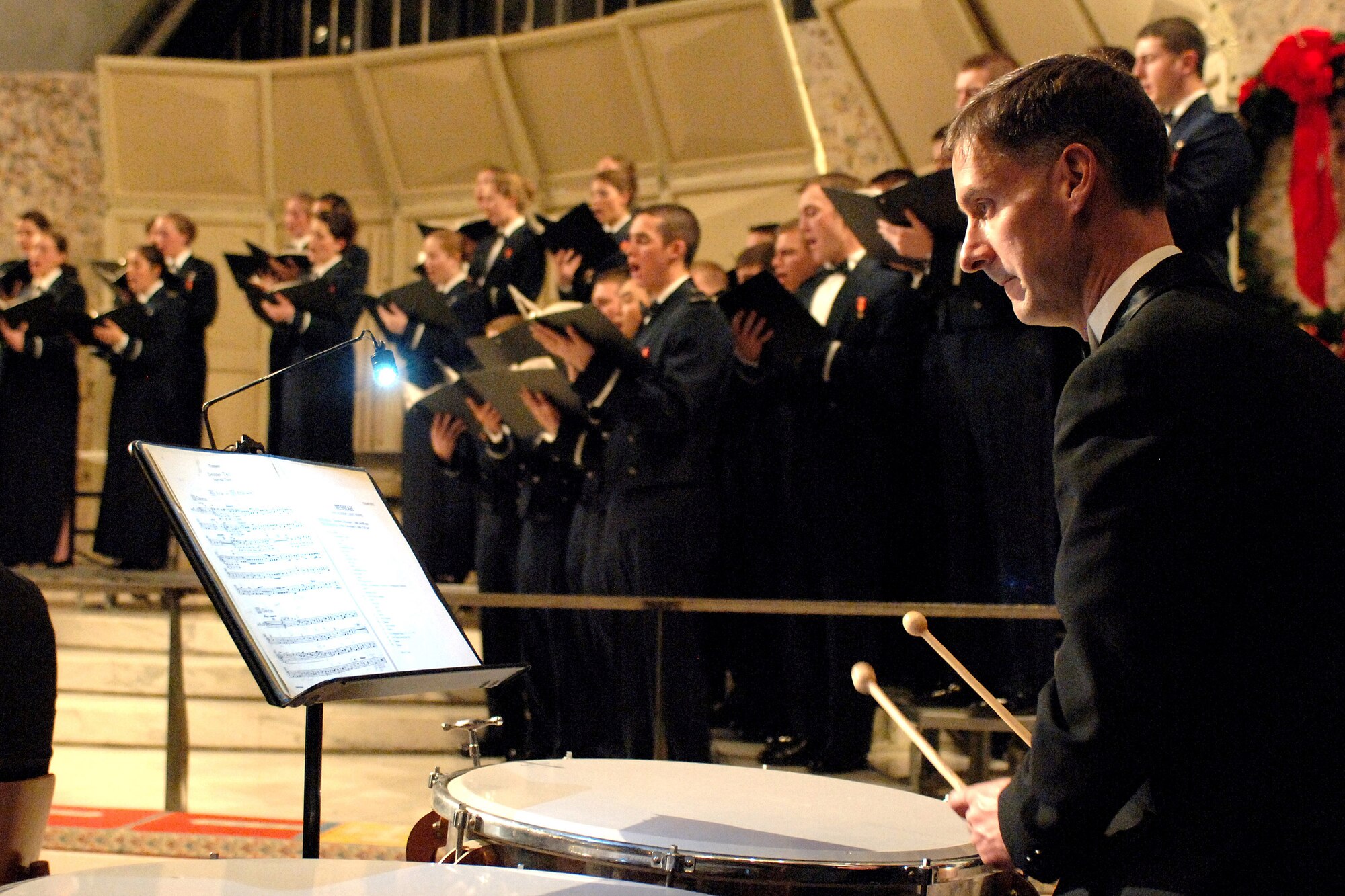 Timpanist Michael Woods performs during the the annual U.S. Air Force Academy's "Messiah" concert Dec. 8 at the Cadet Chapel in Colorado Springs, Colo. The Cadet Chorale is the academy's premiere choral organization. (U.S. Air Force photo/Mike Kaplan) 