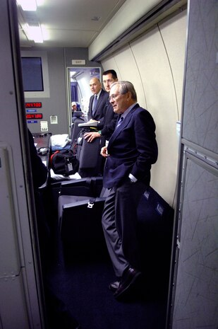 Secretary of Defense Donald H. Rumsfeld meets with staff members while on an E-4B Aircraft, Managua International Airport, Nicaragua, Oct. 1, 2006. Secretary Rumsfeld is visiting Nicaragua to attend the Defense Ministerial of Americas Conference to promote defense and security cooperation among western hemisphere countries. (Defense Dept. photo by James Bowman)