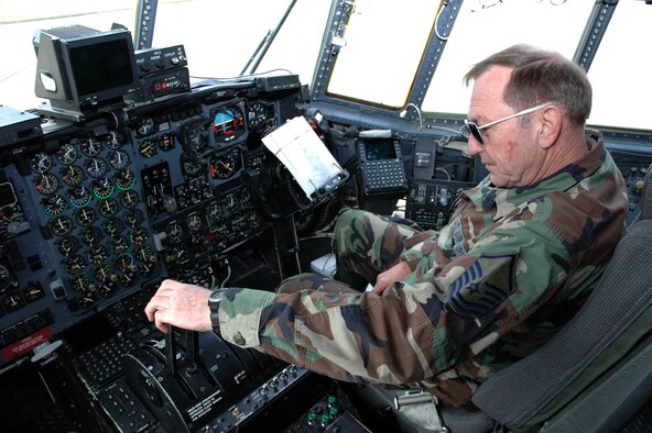 YOUNGSTOWN AIR RESERVE STATION, Ohio -- Air Force Reserve Master Sgt. Kenneth E. Calhoun, crew chief on C-130 aircraft 92-3021 since 1993, retired from the Air Force Reserve Dec. 2, 2006 after 28 years of military service.  The aircraft was nicknamed the "Un-Touch-A-Bull" by a high official of the Sioux Indian Nation during a Jan. 9, 1997 ceremony in Nashville, Tenn. prior to a humanitarian mission to deliver 30,200 pounds of donated food to the Sioux Indians in South Dakota.  U.S. Air Force photo/Master Sgt. Bryan Ripple.