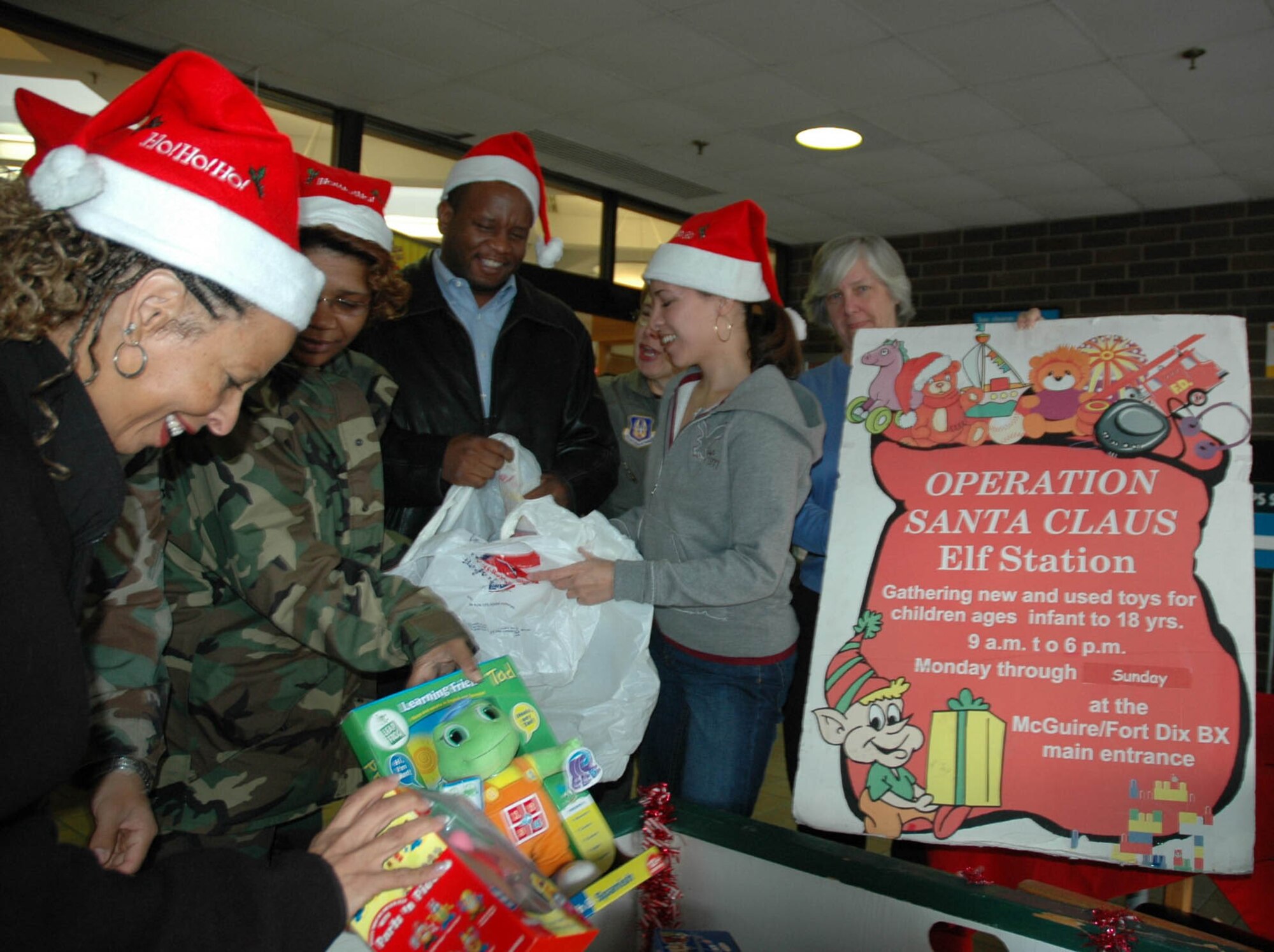 MCGUIRE AIR FORCE BASE, N.J. -- Air Force Reserve members recently contribute to the joint military installation Operation Santa Claus toy drive. Toys collected at the Army and Air Force Exchange Service located between McGuire Air Force Base and Fort Dix, are given to New Jersey-based military famlies in need. (U.S. Air Force photo/Master Sgt. Donna T. Jeffries)
