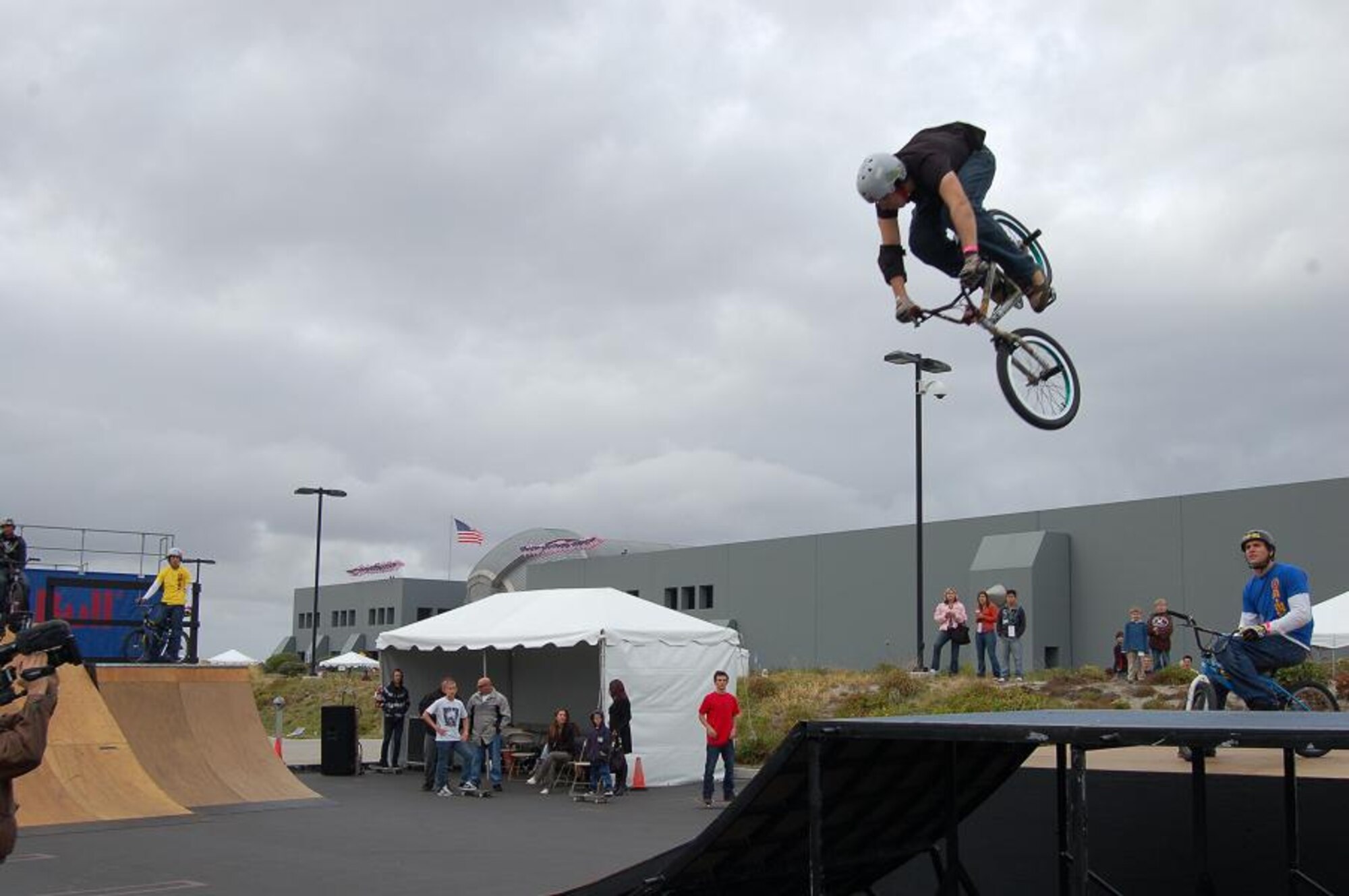 Koji Kraft, a member of the Oakley Bike team, performs a trick during the Oakley Party Dec. 16. The party took place during the second day of the four-day Snowball Express event. The Snowball Express final two day will include a trip to Disneyland and tickets to an Anaheim Ducks game. (U.S. Air Force photo/Staff Sgt. Jeremy Larlee)