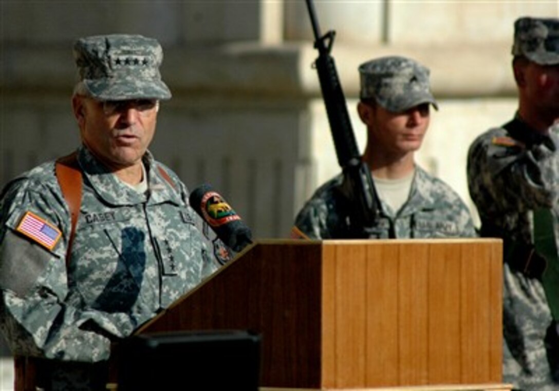 U.S. Army Gen. George W. Casey Jr., commander of Multi-National Force - Iraq, speaks during a ceremony marking the transfer of the Multi-National Corps - Iraq  mission from V Corps to III Corps at Camp Victory, Iraq, Dec. 14, 2006. 