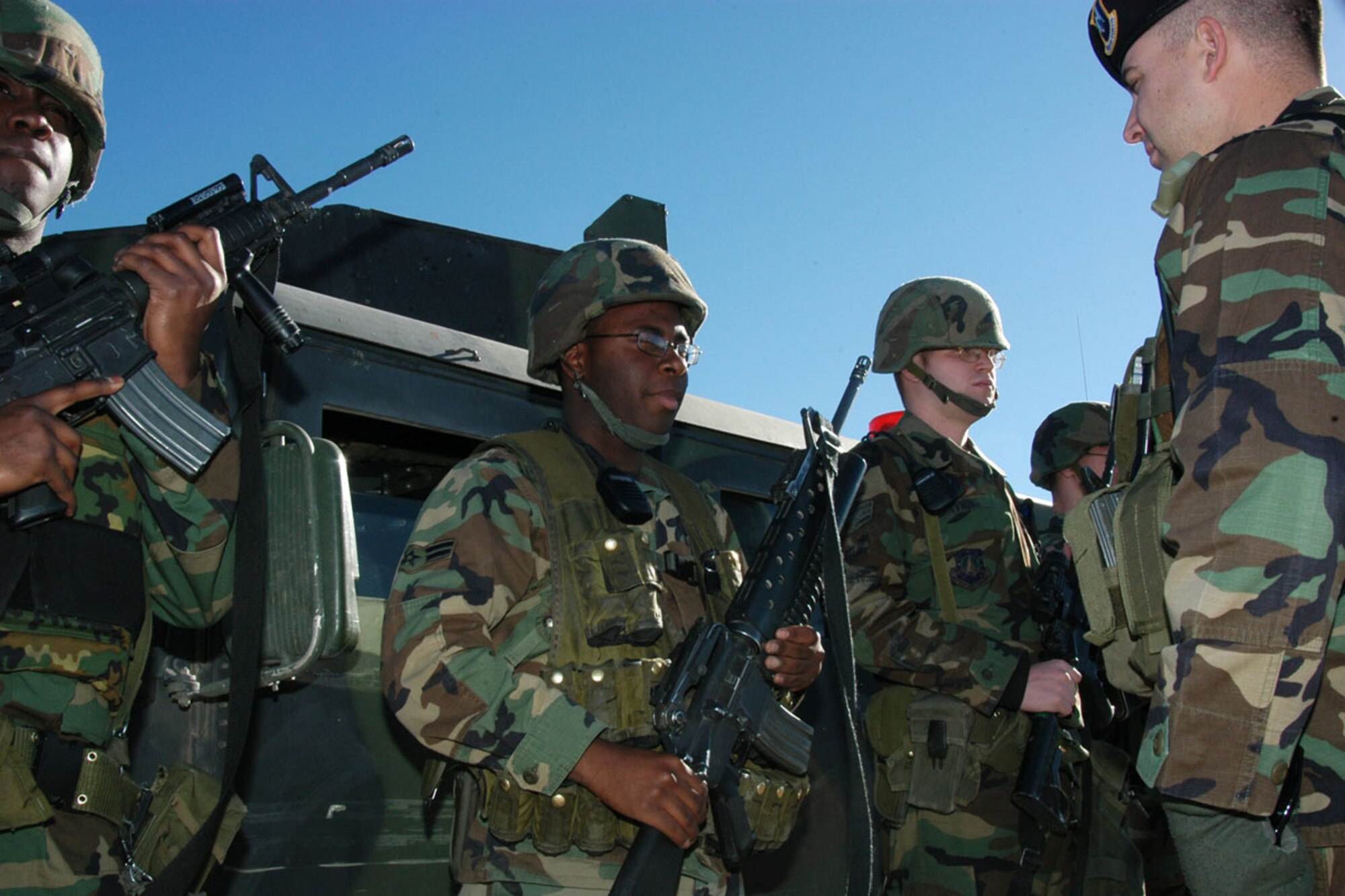 Members of the 90th Security Forces Group listen to their outbrief during the Missile Standardization Evaluation and Training here last week.