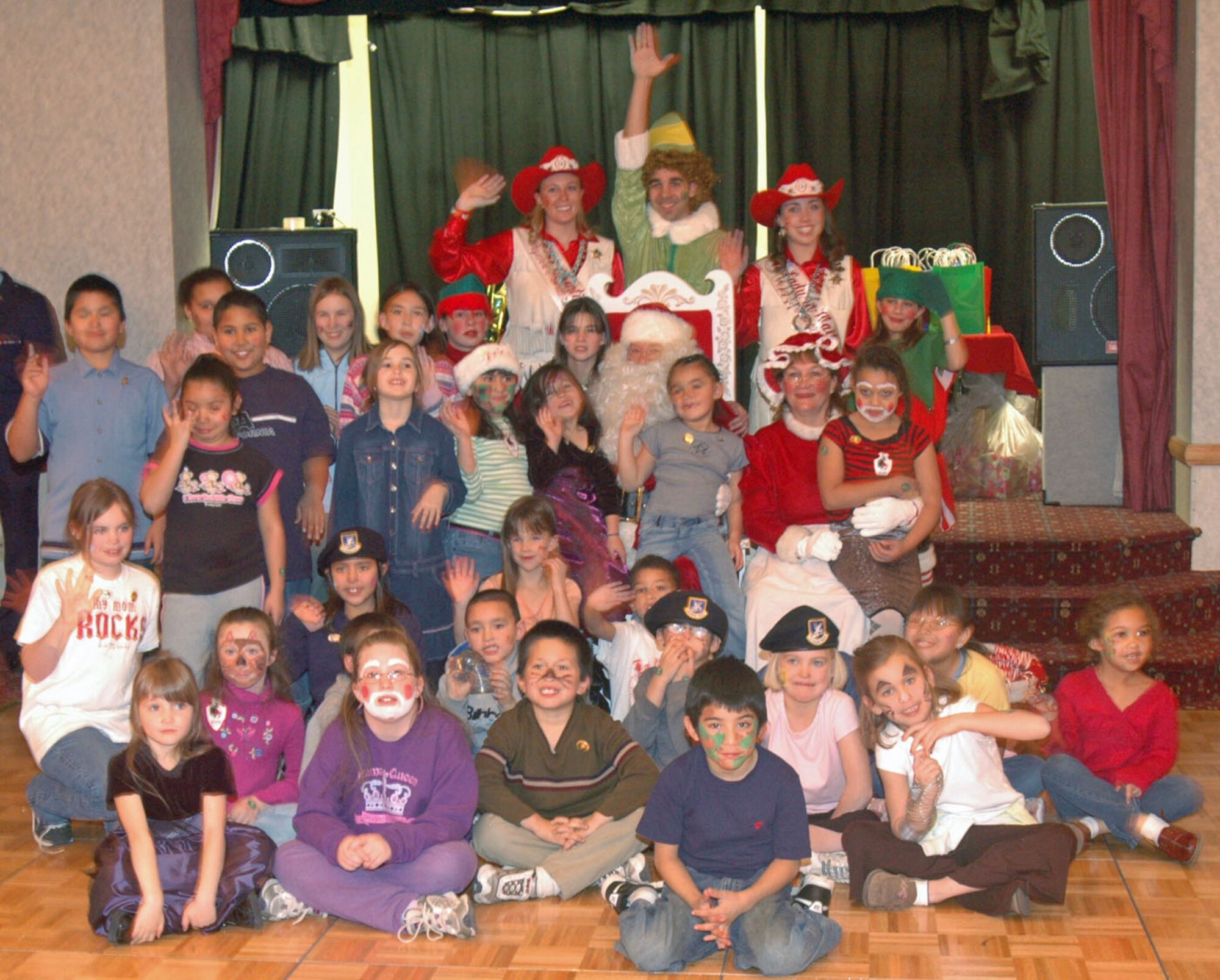 Thirty-eight local children attended OPJ where they received lunch, gifts and a visit from Santa. Each child also talked to Warren Airmen who volunteered to escort the children during the event.