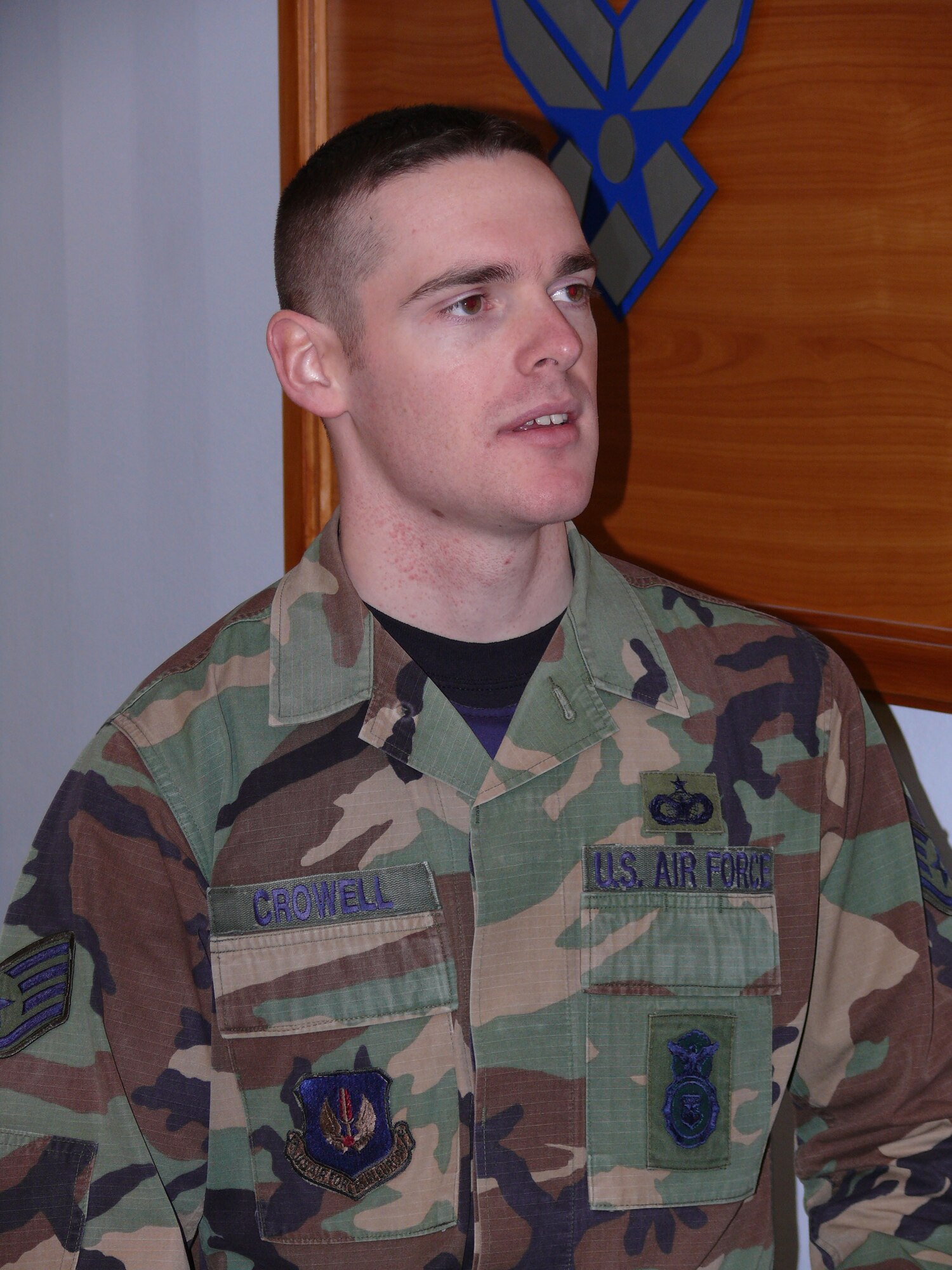 Staff Sgt. Joey Crowell is a security forces Airman at U.S. Air Forces in Europe headquarters at Ramstein Air Base, Germany. As an area supervisor it's his job to ensure the commanders and facility are kept out of harm's way. That means working throughout the holidays. (U.S. Air Force photo/Staff Sgt. Leigh Bellinger) 

