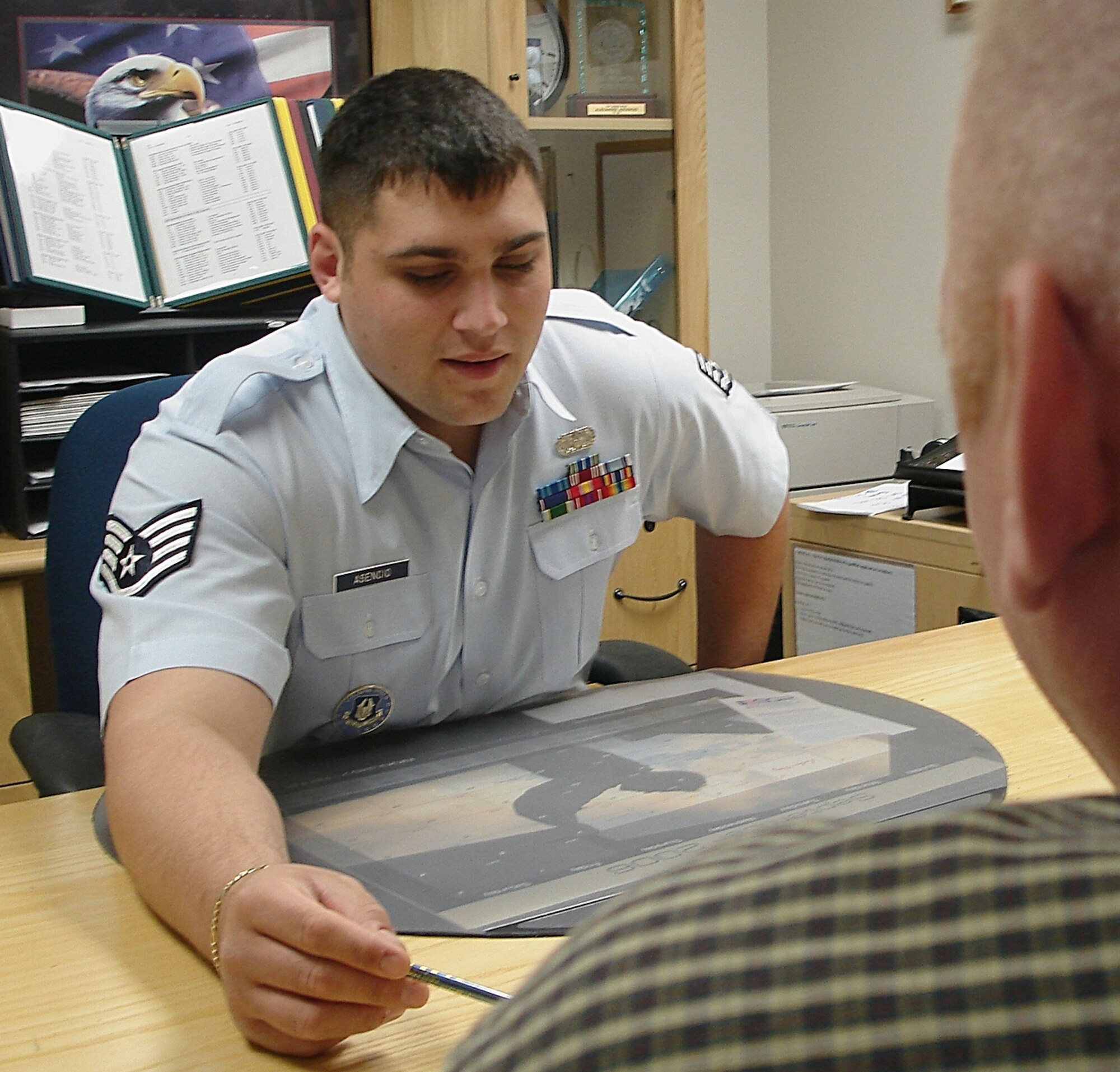 Staff Sergeant Alex Asencio reached 300-percent of his goal during his first six months on the job. As of Dec. 18, he has already reached 52-percent of his goal for the entire 2007 fiscal year and is rated as the third best line-recruiter in the Air Force Reserve Command. Sergeant Asencio is a rookie recruiter for the 482nd Fighter Wing here at Homestead Air Reserve Base, Fla. (U.S. Air Force photo/Dan Galindo)