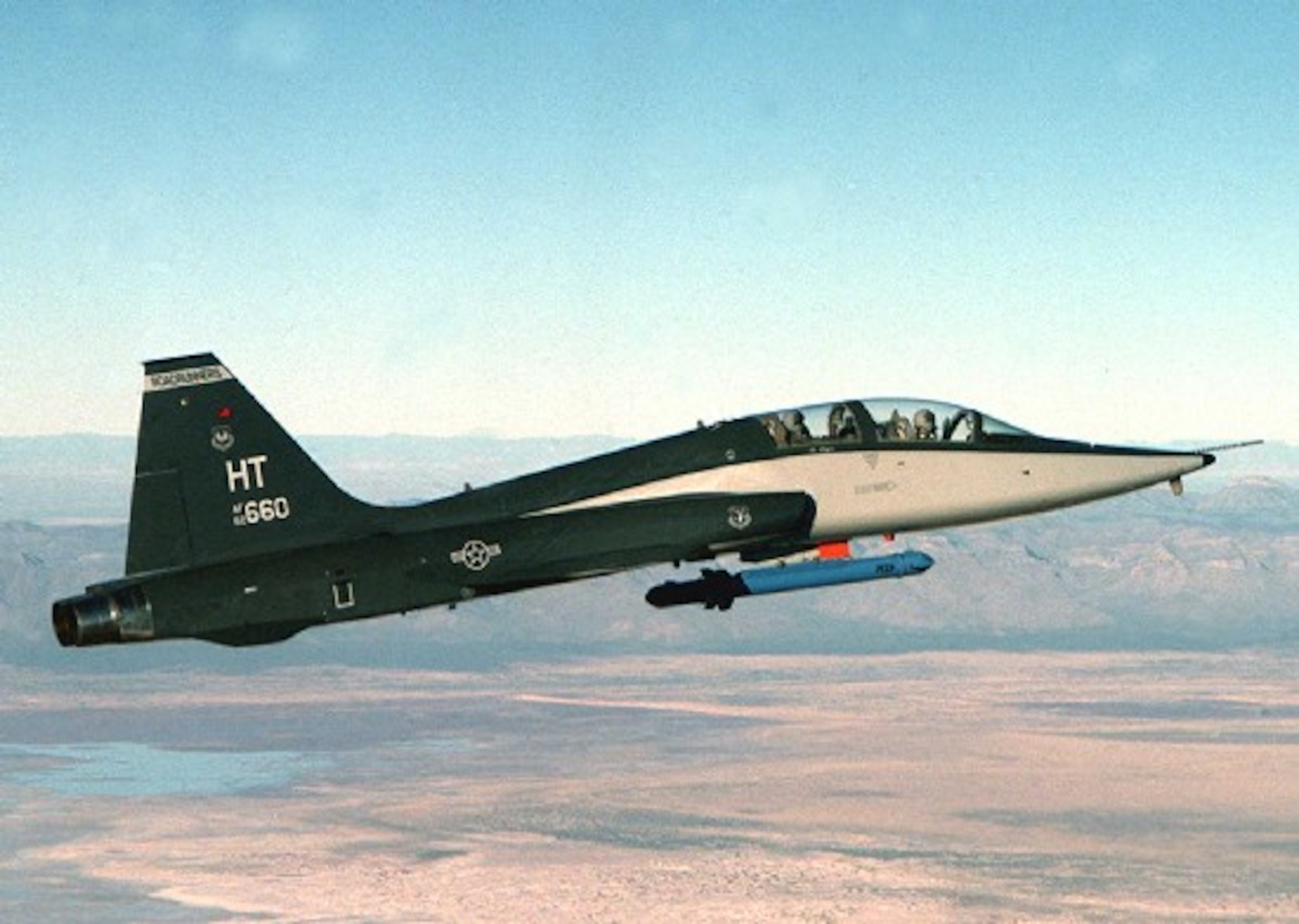 The AT-38B has a modified centerline pylon to enable carriage of many types of test and operational stores such as the ALQ-167 Electronic Counter Measures (ECM) pod, which is programmable with a wide variety of electronic jamming techniques as well as an ALE-40 chaff and flare pod.
