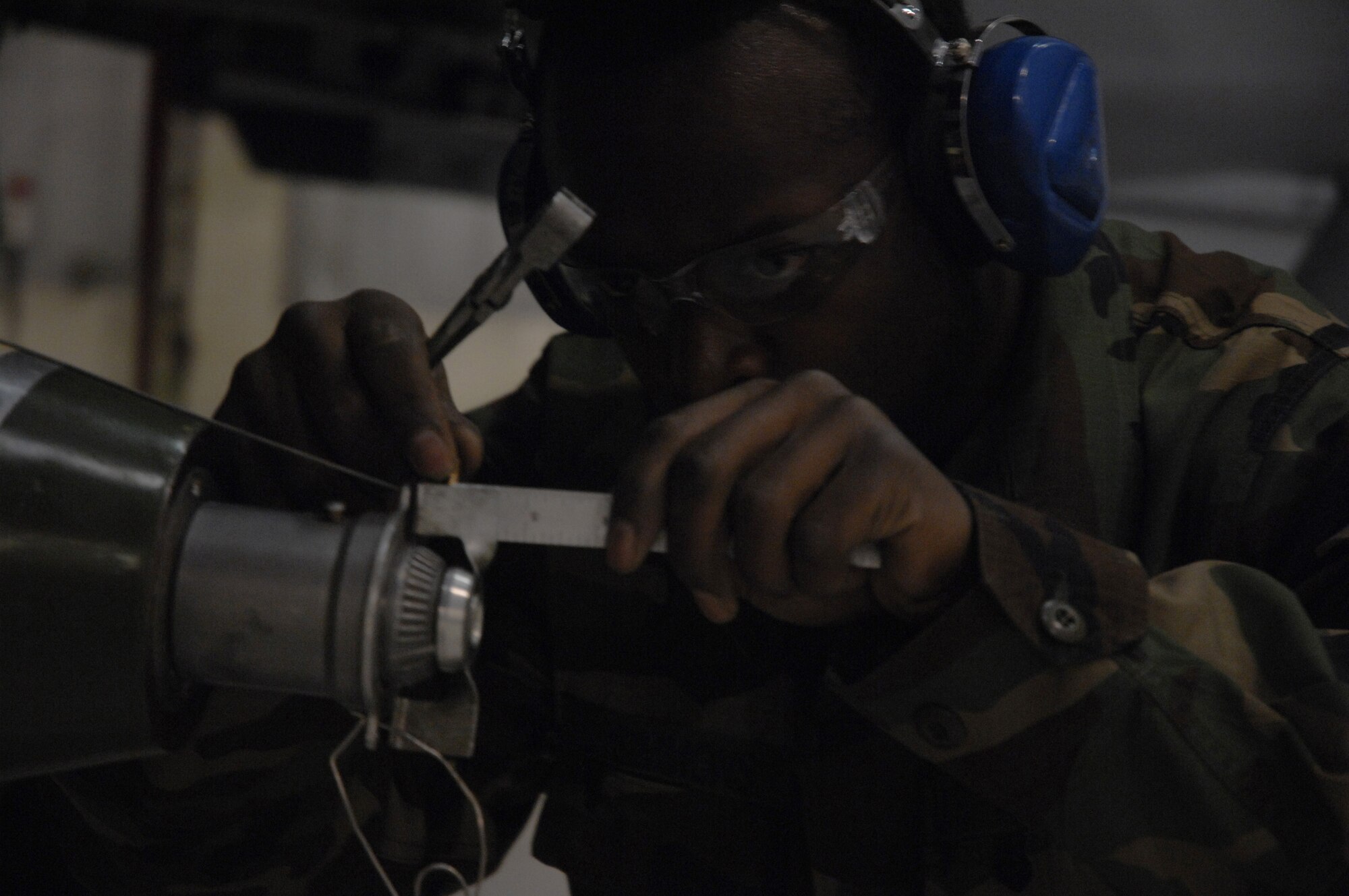 EIELSON AIR FORCE BASE, Alaska -- Senior Airman Vankeithin Simmons works on a MK-82 bomb during the Load Crew of the Quarter contest here on 15 December. The Airman represents the 355th Aircraft Maintenance Unit (AMU) and the quarterly contest pitts the 18th AMU versus the 355th AMU. Both teams loaded 2 MK-82 low drag bombs and one AIM-9 sidewinder missile to their respective aircraft.
(U.S. Air Force Photo by Staff Sgt Joshua Strang)
