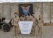 Members of the 916th Air Refueling Wing, Air Force Reserve, send a holiday message home to Goldsboro, N.C. These members of the 916th Civil Engineer Squadron are spending their holidays stationed in Iraq.