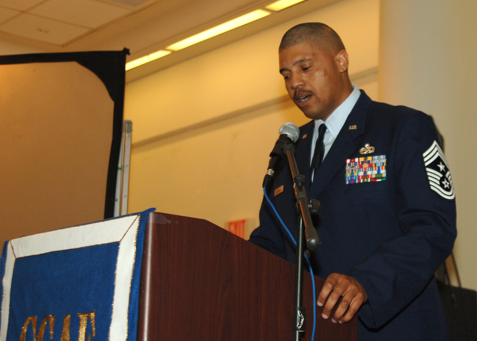 Chief Master Sgt. Jeffrey A. Antwine, 39th Air Base Wing command chief, speaks at the Community College of the Air Force graduation ceremony held at the Incirlik Club Complex, Dec. 15. (U.S. Air Force photo by Airman 1st Class Kelly L. LeGuillon)