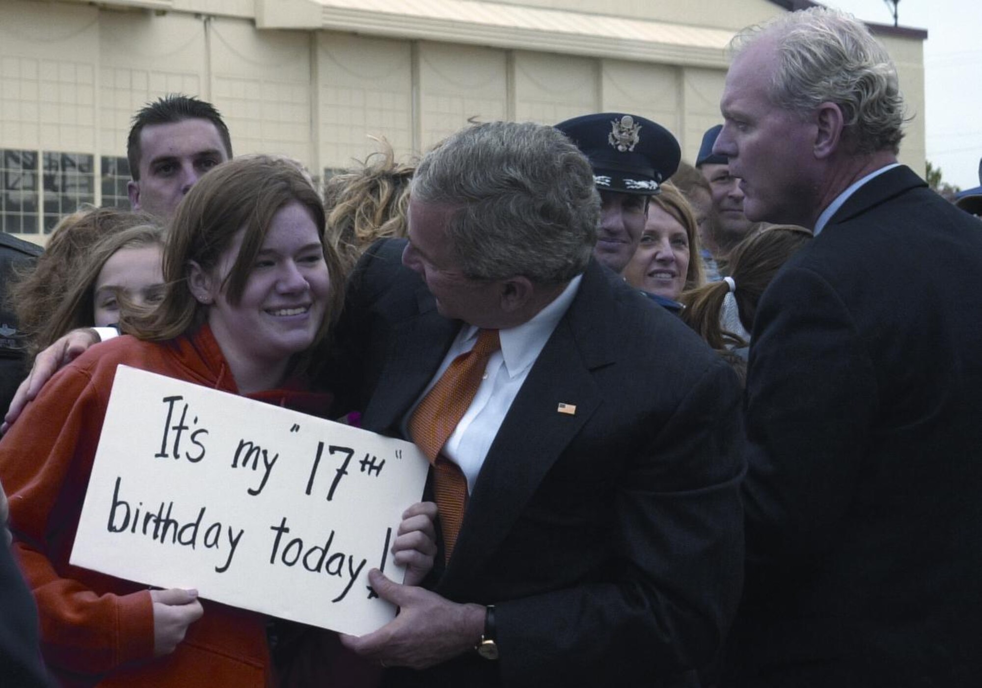 President George W. Bush congratulates Betsy Kriner on her 17th birthday on Saturday at Vance. Betsy is the daughter of Col. Kevin Kriner, 71st Operations Group commander, and his wife Mary. The president stopped at Vance on his way to Oklahoma State University in Stillwater to give the commencement address.(Photo by Staff Sgt. Amanda Savannah)