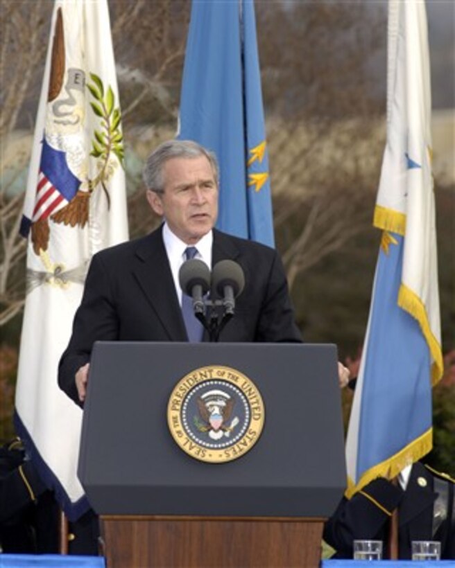 President George W. Bush offers praise to outgoing Secretary of Defense Donald H. Rumsfeld during Pentagon farewell ceremonies on Dec. 15, 2006.  Bush pointed out that Rumsfeld, the second longest serving secretary of defense in the nation's history and the only one to serve in the post under two different presidents, was also the only one to serve in two different centuries.  Rumsfeld relinquishes the Pentagon post to former CIA Director Robert Gates.  