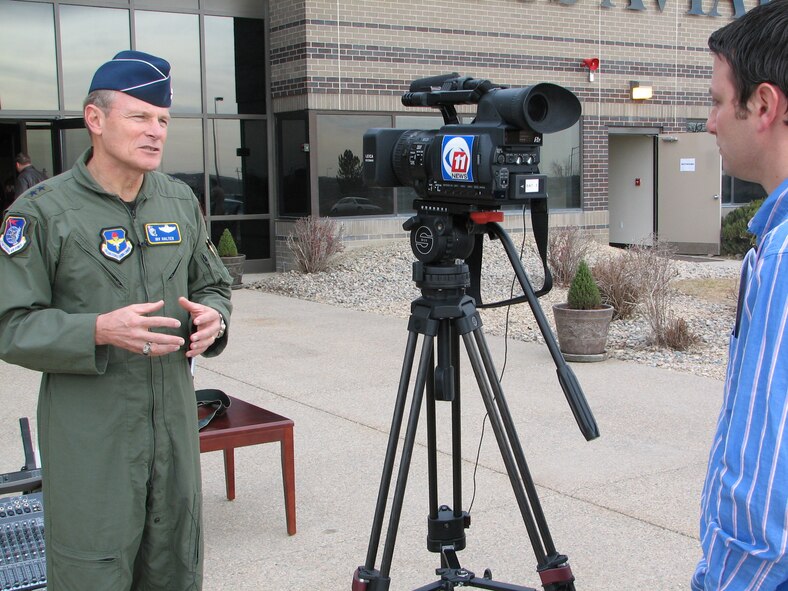 Maj. Gen. Irv Halter, 19th Air Force commander, speaks about the importance of the new Initial Flight Screening program to reporter Josh Earl, KKTV Channel 11, Colorado Springs, Colo. during an interview Friday (Dec. 15, 2006).  The general was in Pueblo, Colo. to officially open and dedicate the new, 200,000 square foot IFS facility provided under contract with Doss Aviation, Inc.  General Halter referred to the IFS program as "the gateway to flying training," and noted that "all big journeys start with a single step." (U.S. Air Force photo by Tech. Sgt. Mike Hammond)