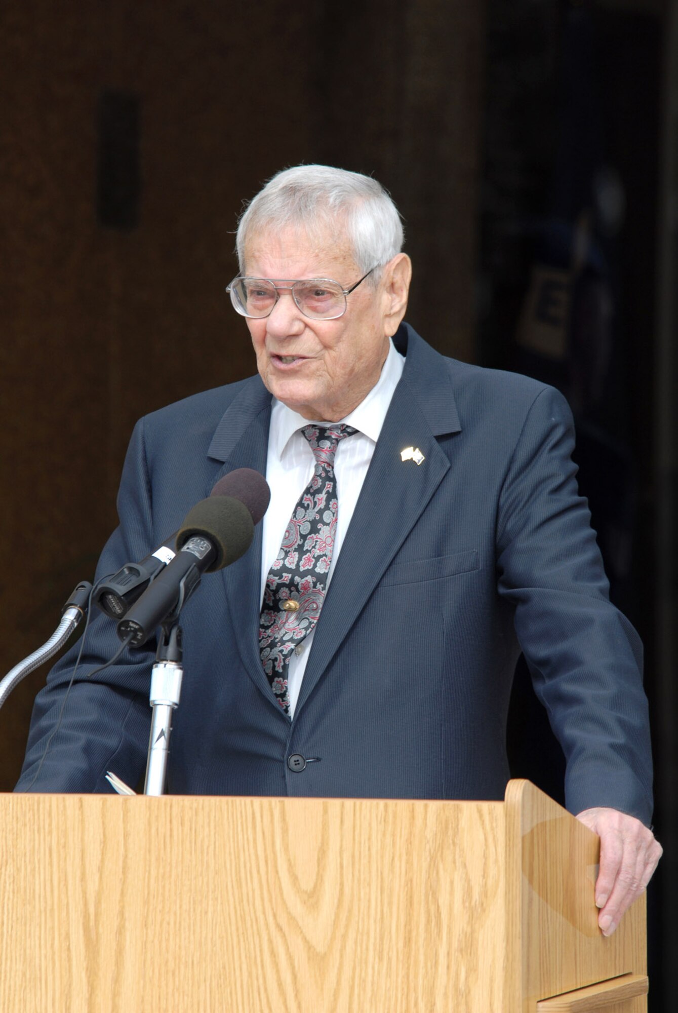 Former Chief Master Sgt. of the Air Force Paul Airey speaks during the dedication of the NCO Academy named in his honor Dec. 13 at Tyndall Air Force Base, Fla. (U.S. Air Force photo/Lisa Norman) 
