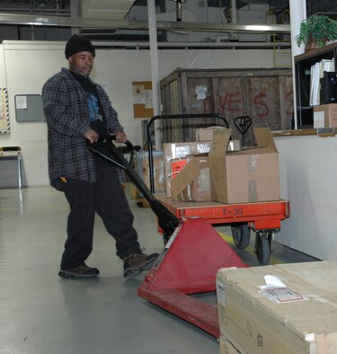 YOUNGSTOWN AIR RESERVE STATION, Ohio—Employees like Mr. Tori Nelson, a warehouse specialist with East Inc., provide critical Base Operating Support functions to the 910th Airlift Wing.  Mr. Nelson, a resident of Youngstown, Ohio has been employed here for six years.  "It's interesting being on the inside where troop support begins in base supply," said Mr. Nelson.  "The base is a great place to train our reservists," he said.  U.S. Air Force photo/Master Sgt. Bryan Ripple.