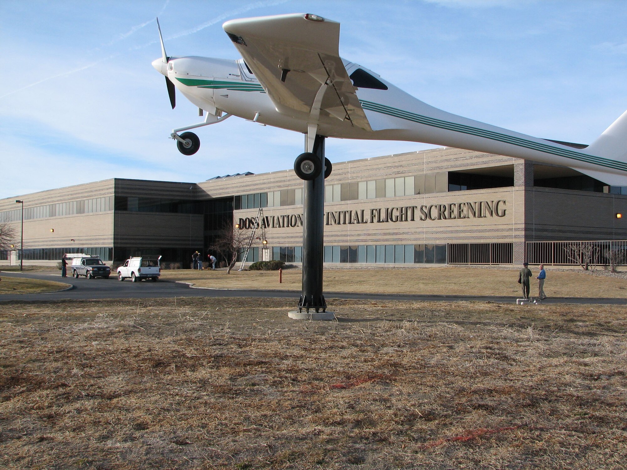 Workers put the finishing touches on the Initial Flight Screening program's new facility, which formally opened Friday (Dec. 15, 2006) in Pueblo, Colo.  The 200,000 square foot building was renovated by Doss Aviation under a contract with the Air Force.  The 10-year, $178 million contract calls for up to 1,700 pilot candidates to be screened per year at the site when fully operational. (U.S. Air Force photo by Tech Sgt Mike Hammond)