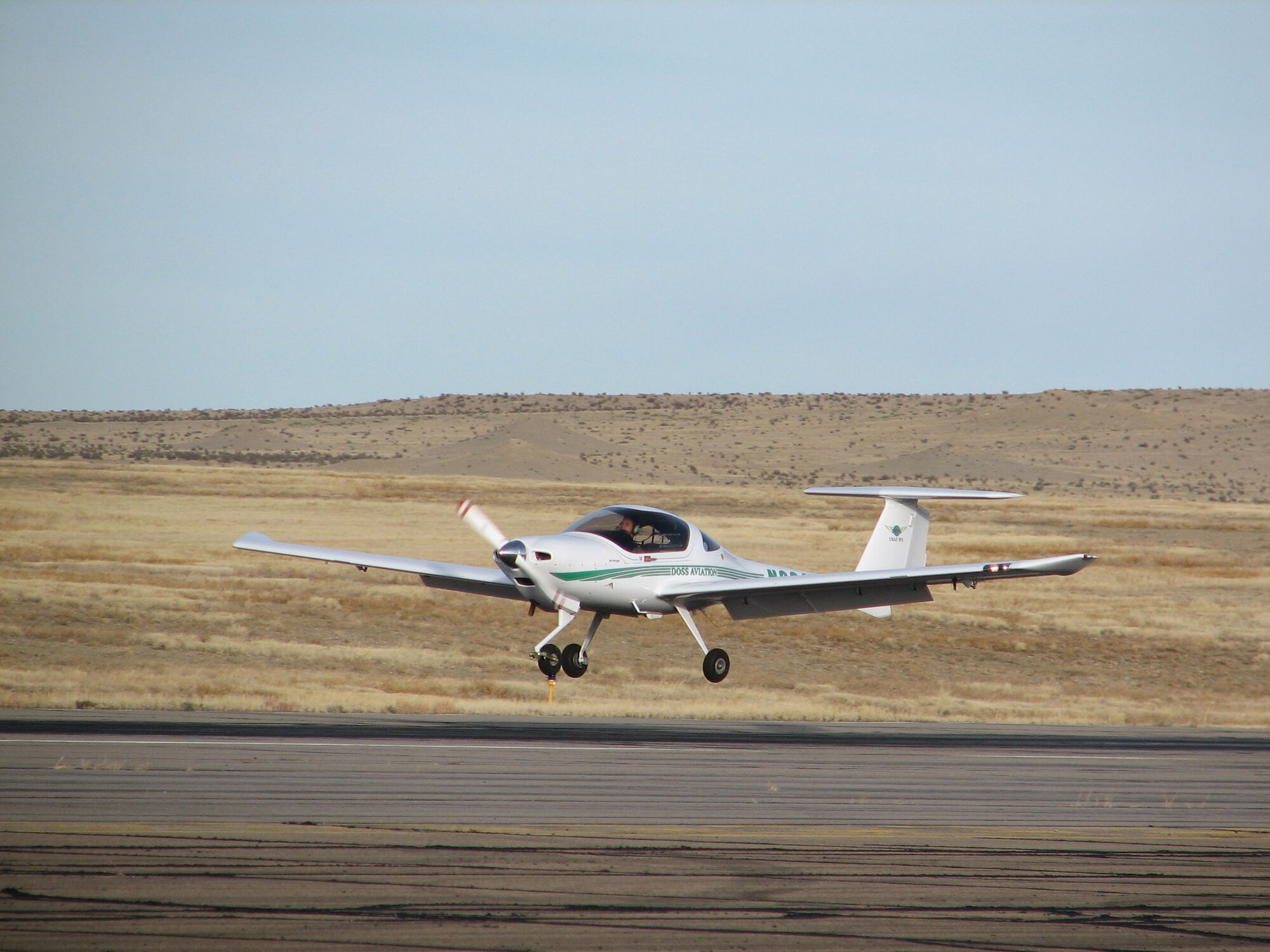 Second Lieutenant John Herd, an Initial Flight Screening student, lands a Diamond DA-20 trainer aircraft on the flightline of Pueblo Memorial Airport in Pueblo, Colo., Thursday, Dec. 14.  Lieutenant Herd completed his final solo sortie of the program with the landing, and has two check flights remaining before completing the program this week.  He will attend SUPT at Vance Air Force Base, Okla., in July 2007.  (Air Force photo by Tech Sgt Mike Hammond)