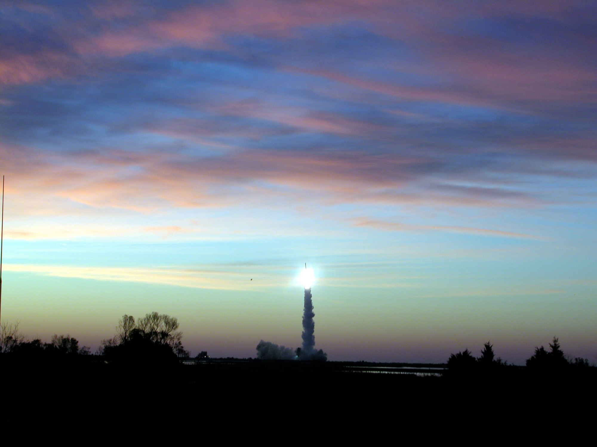 A Minotaur I rocket lifts off carrying the TacSat-2 micro satellite as well as NASA's GeneSat-1 spacecraft Dec. 16 from NASA's Wallops Island Flight Facility near Wallops Island, Va. Featuring approximately 11 onboard experiments, TacSat-2, administered by the Air Force Research Laboratory's Space Vehicles Directorate at Kirtland Air Force Base, N.M., serves as the forerunner for rapid, responsive satellite production, launch and operation. (U.S. Air Force photo/Michael P. Kleiman)