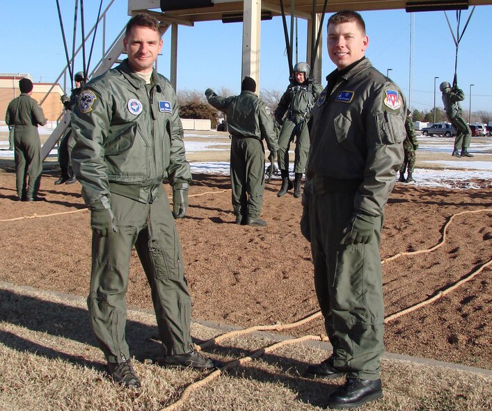 Master Sgt. Bradley Tucker and Capt. Kris Ostrowski, 71st Medical Operations Squadron, supervise jump training for a new class of student pilots. Sergeant Tucker was named the aerospace physiology senior NCO of the year and Captain Ostrowski the company grade physiologist of the year for AETC.
