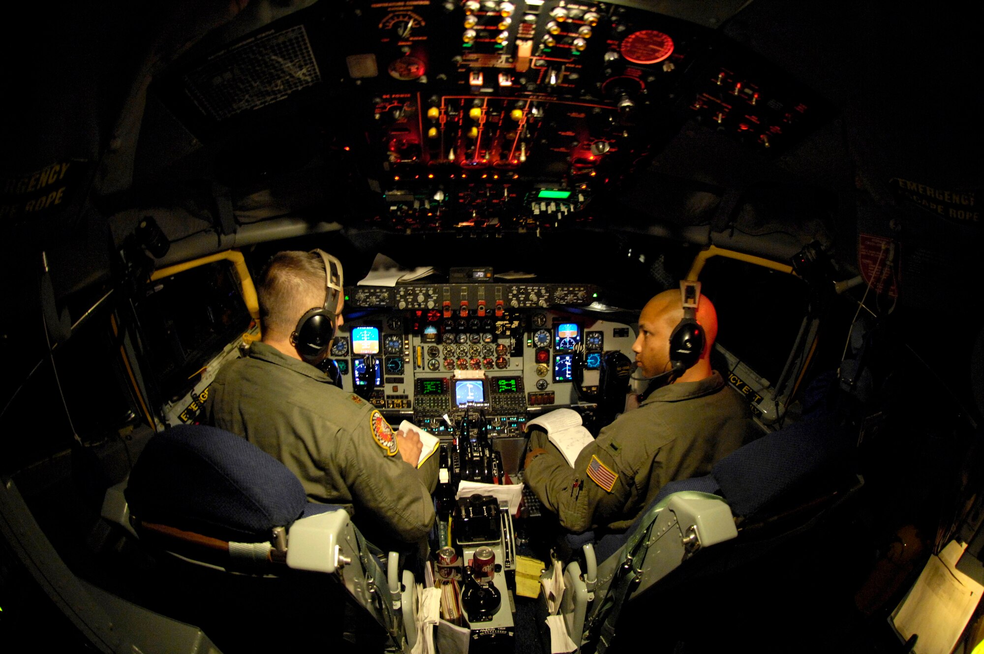Pilots go over their checklist before coming in on approach Dec. 15 to Hickam Air Force Base, Hawaii. The KC-135 Stratotanker pilots are from the 74th Air Refueling Squadron based at Grissom Air Force Reserve Base, Ind. (U.S. Air Force photo/Tech. Sgt. Shane A. Cuomo) 
