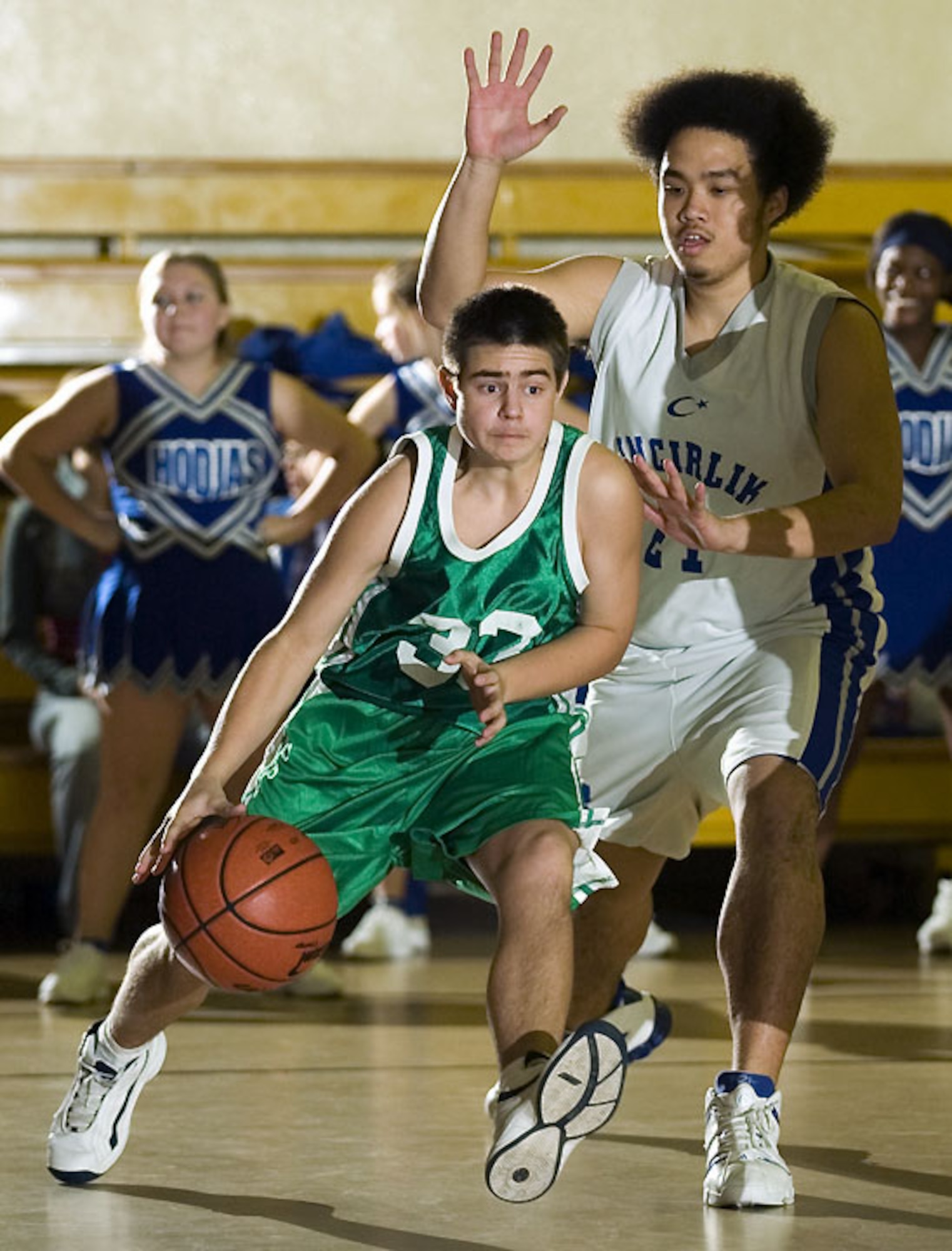 Josh Callahan guards an Ankara boys basketball team members during the game Dec. 16. The Hodjas boys and girls basketball team played Ankara's team Dec. 15 and 16 at Incirlik taking both wins by more than 40 points. (U.S. Air Force photo by Ismael Gomez)
