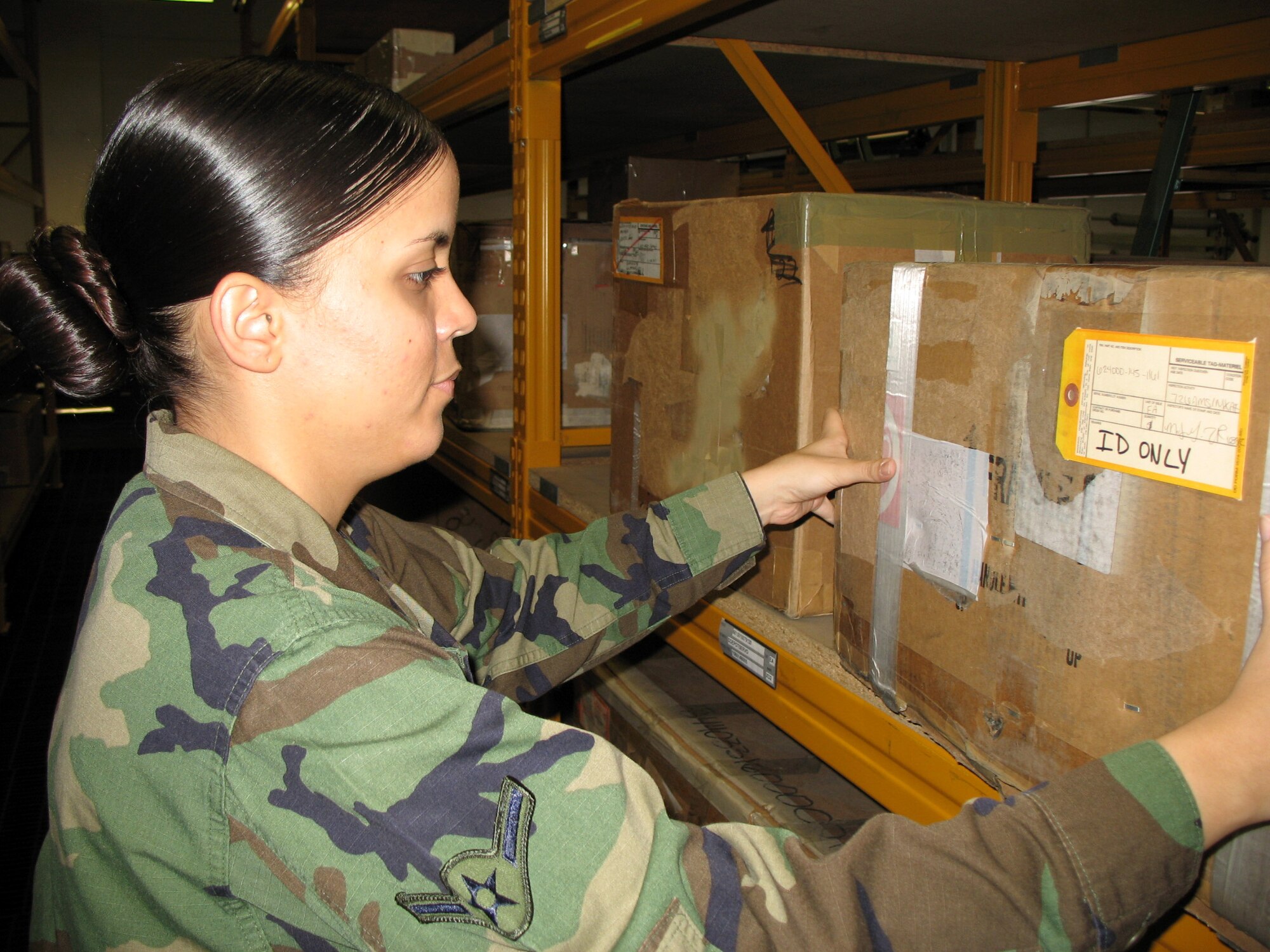 Airman Marilyn Torres stocks shelves filled with aircraft parts and supplies at Spangdahlem Air Base, Germany, Dec. 8. Shelving items is one of the final steps after processing of forms and input into a computer database. Her efforts ensure heavy aircraft assigned to the 726th Air Mobility Squadron are mission-ready. (U.S. Air Force photo/Staff Sgt. Brandon Hoyt)