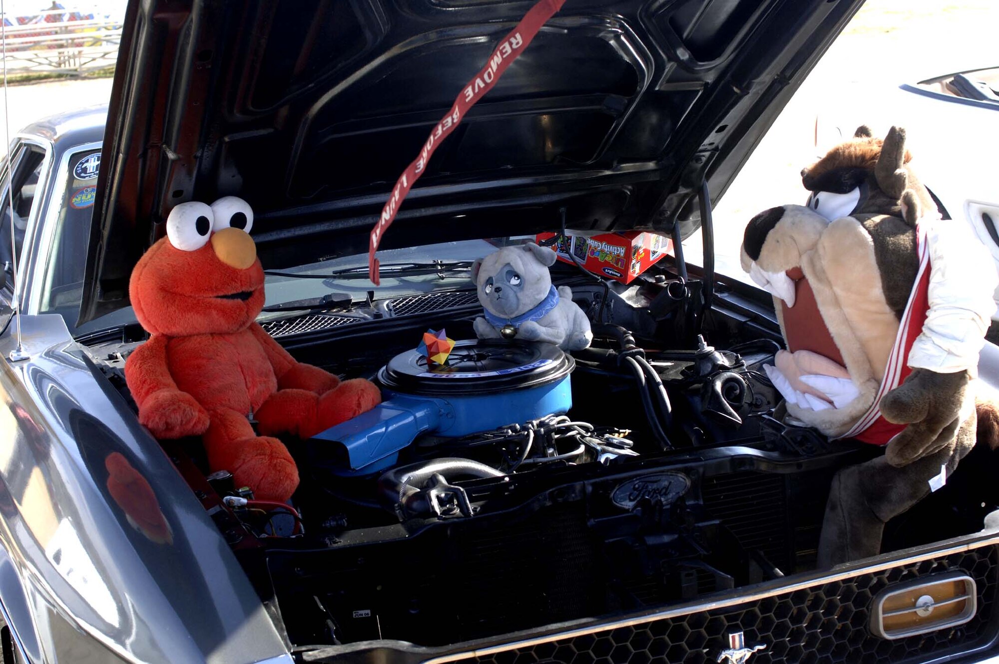 Members from the Alamogordo Motorcycle Club display their cars at Washington Park in Alamogordo to help collect toys for Toys for Tots Saturday. (U.S. Air Force photo by Staff Sgt. Jason Colbert)