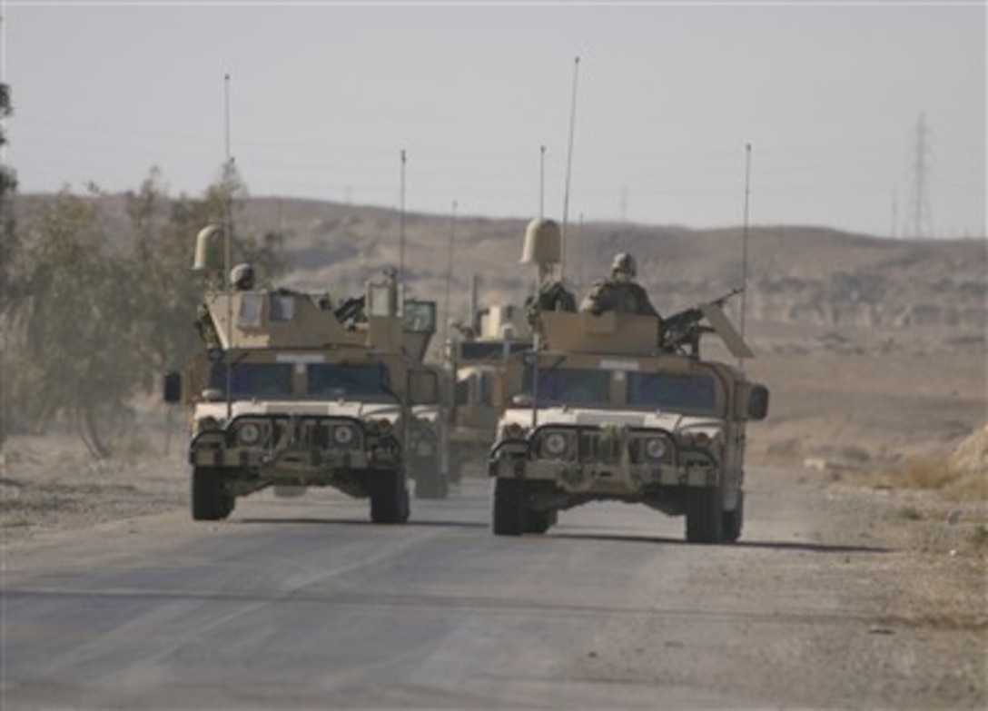 U.S. Marines of Marine Wing Support Squadron 273 convoy to Haditha Dam in the Al Anbar province of Iraq, Dec. 5, 2006.