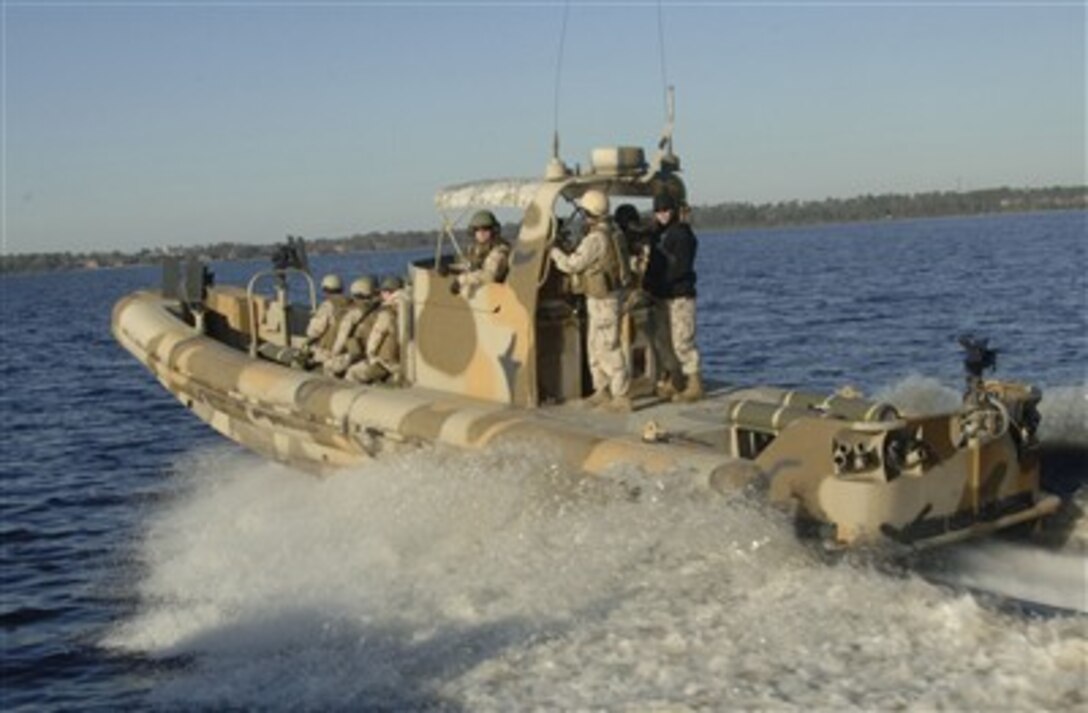 U.S. Navy sailors attached to Riverine Squadron 1 participate in a weeklong final evaluation along the coast of Jacksonville, N.C., Dec. 5, 2006, in preparation for an upcoming deployment to the Middle East in support of Operation Iraqi Freedom.