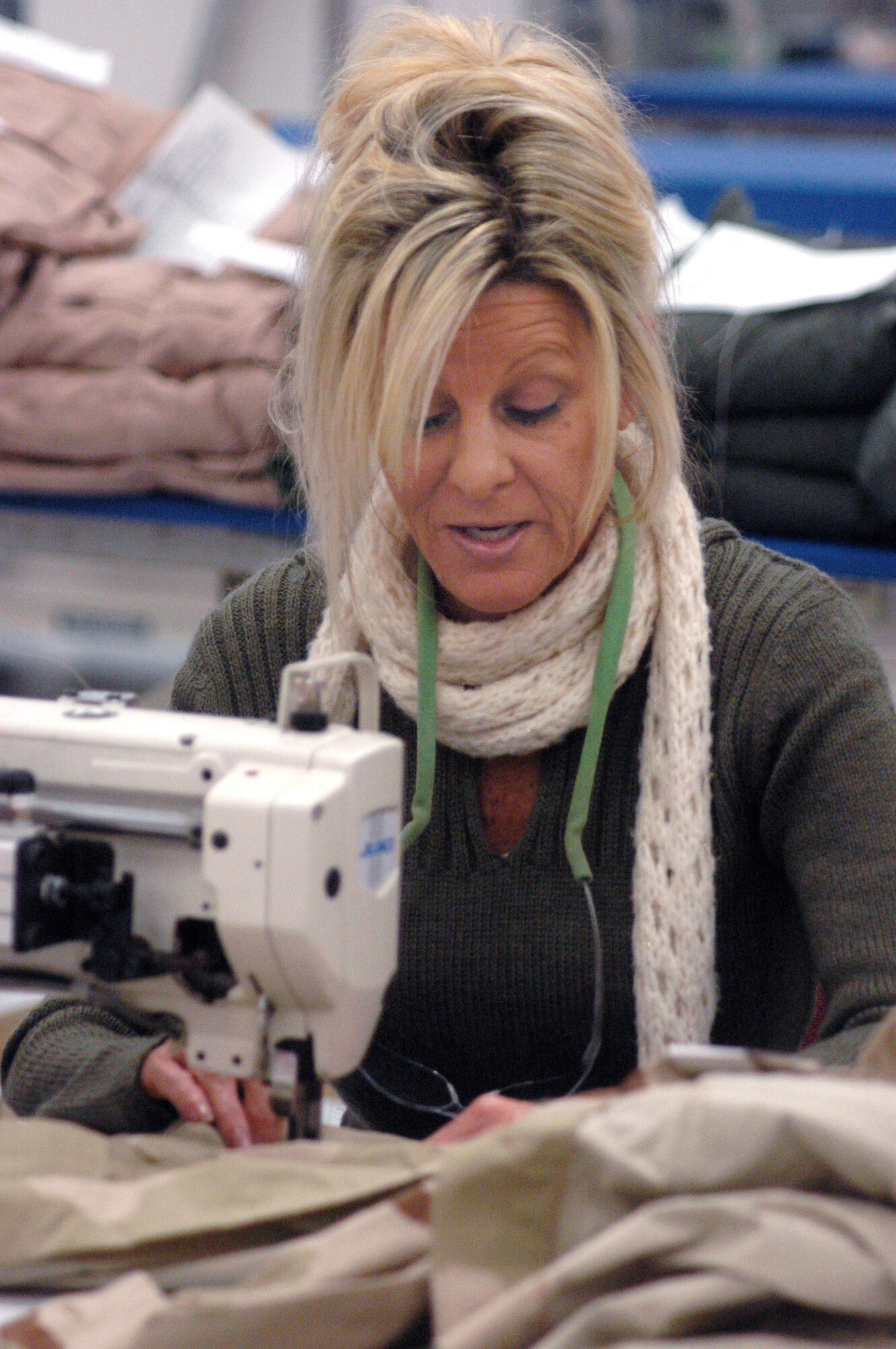 Diane Couch, a fabric worker in the 402nd Maintenance Wing’s Fabric and Survival shop, sews patches on uniforms.
U.S. Air Force photo by SUE SAPP