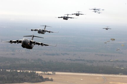 Twenty U.S. Air Force C-17 Globemaster IIIs fly over Charleston, S.C., Dec. 21, 2006.  The C-17s, assigned to the 437th and 315th Airlift Wings at Charleston Air Force Base, S.C., were part of the largest C-17 formation in history from a single base and demonstrated the strategic airdrop capability of the U.S. Air Force. (U.S. Air Force photo by Senior Airman Richard W. Rose Jr.)