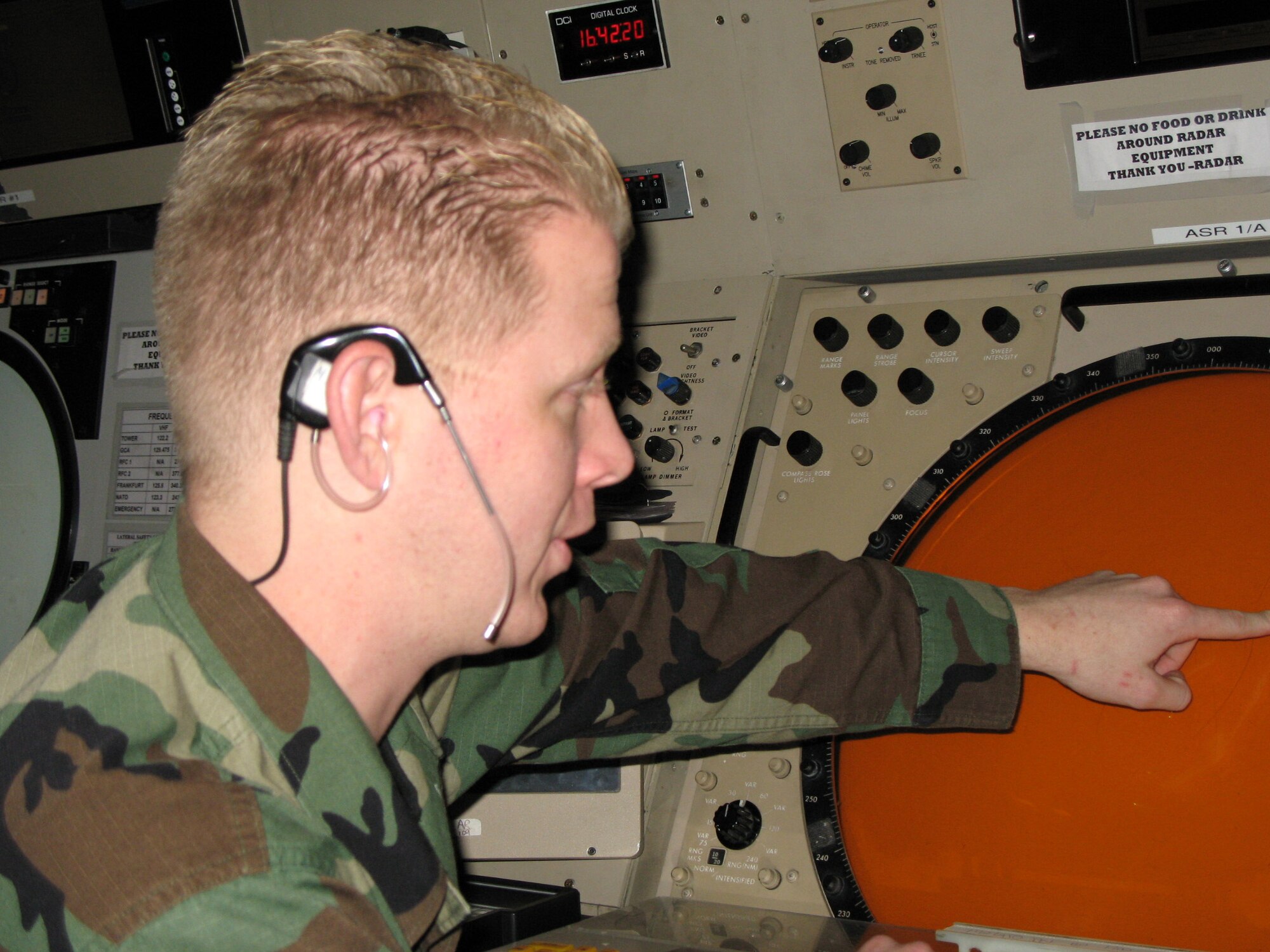 Senior Airman Matt Hodges is assigned to the 52nd Operation Support Squadron at Spanghdahlem Air Base, Germany. He volunteered to serve through the season on Christmas Day so that his fellow air traffic controllers can enjoy some holiday fun with their families. (U.S. Air Force photo/Tech. Sgt. Szu-Moy Ruiz)
