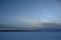 EIELSON AIR FORCE BASE, Alaska -- The sun rises over Eielson Air Force Base on Dec 21 which marks the Winter Solstice, the shortest day of the year. At Eielson Air Force Base the sun rose at 1052 and set at 1441 today resulting in a total of 3 hours and 49 minutes from sun up to sun down. This night will be extra dark due to the moon being completely below the horizon all day resulting in 0% moonlight illumination.
(U.S. Air Force Photo by Staff Sgt Joshua Strang)