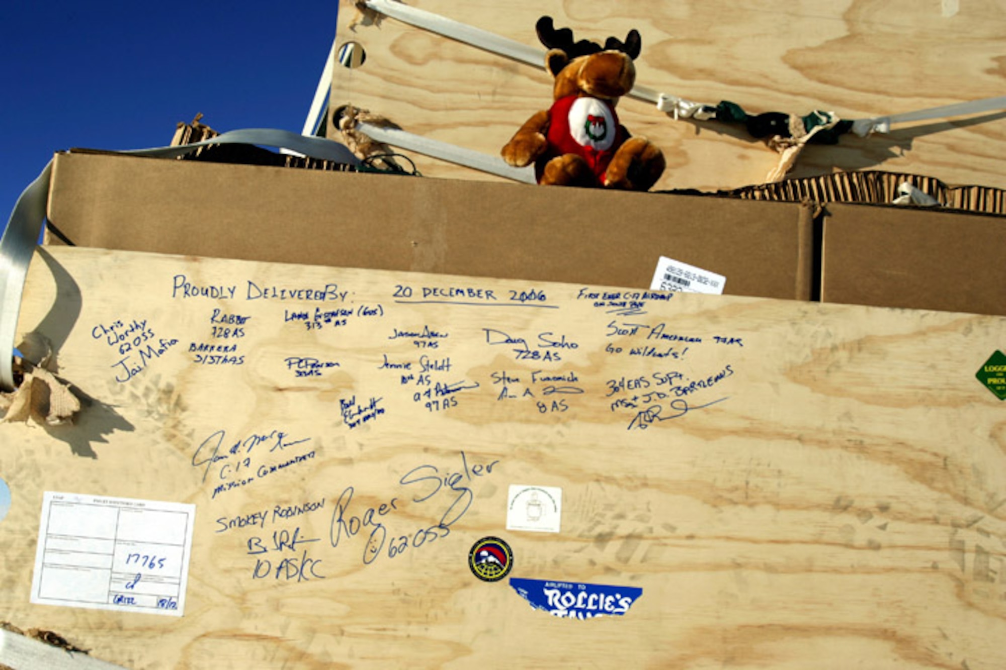 An autographed cargo pallet sits in the snow after being airdropped from a C-17 Globemaster III Dec. 20 to members of the National Science Foundation wintering in the Antarctic.  Airmen from the 62nd and 446th Airlift Wings at McChord Air Force Base, Wash., delivered 70 tons of supplies to the team. The mission was a "proof of concept" flight for the C-17 and was part of Joint Task Force-Support Forces Antarctica's Operation Deep Freeze.  (U.S. Air Force photo/Lt. Col. James McGann)