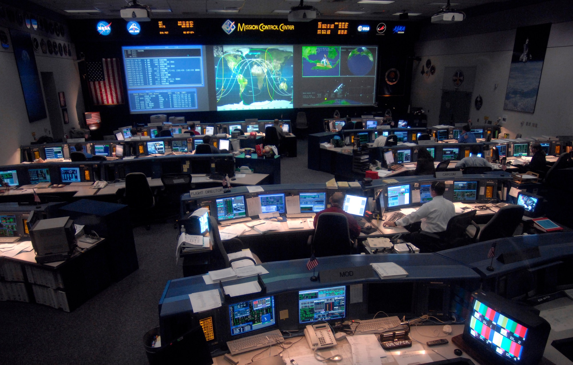 Astronauts work in the Mission Control Center during a space shuttle mission to the International Space Center Dec. 15 at the Johnson Space Center in Houston. (U.S. Air Force photo/Tech. Sgt. Larry Simmons)
