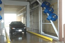 MINOT AIR FORCE BASE, ND – A government vehicle drives through the base’s new automated carwash Dec. 21, 2006. It is fully equipped with infrared sensors, underbody wash, wax applicator, and even a touchpad to record vehicle registration numbers. As a fully-automated carwash, it will minimize damage to the base’s fleet of GOVs, while reducing man-hours spent hand-washing the vehicles. (U.S. Air Force photo by Airman 1st Class Christopher Boitz.) 