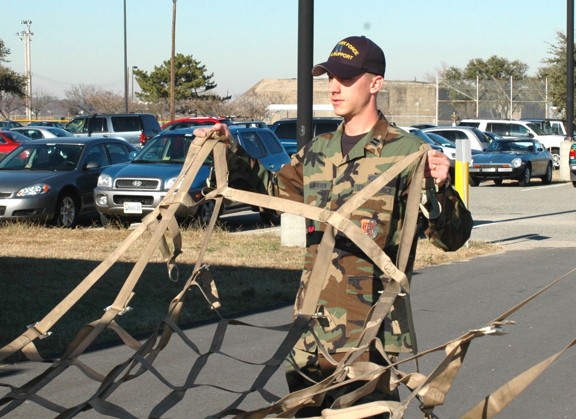 Capt. Ryan Rasmussen, an action officer for Joint Task Force Civil Support Communications directorate, helps palletize communications equipment during a deployment exercise at Fort Monroe, Va. (U.S. Marine Corps photo/Marine Staff Sgt. Chris Hale)
