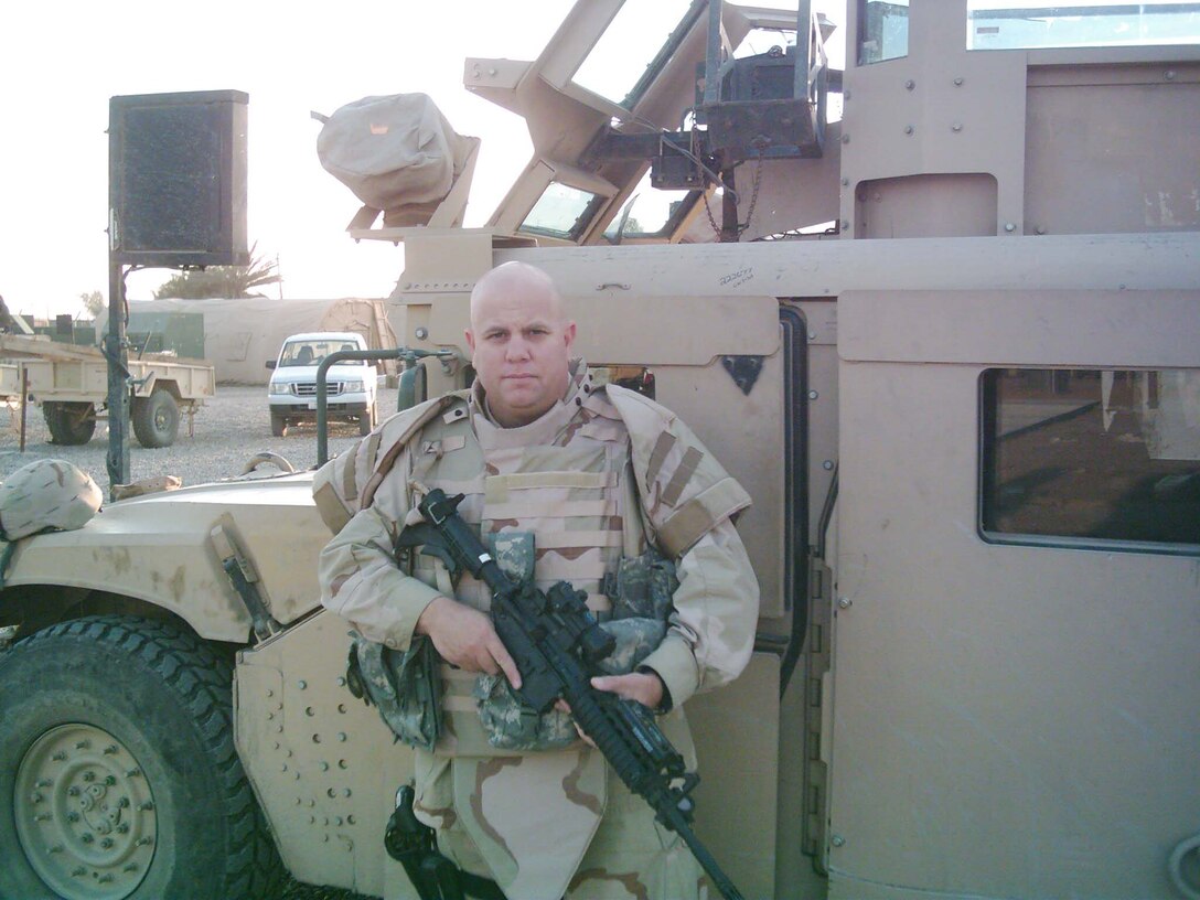 Staff Sgt. Zachary Harthorne is recognized for his outstanding performance while serving with the 70th Medium Truck Detachment, Iraq. 