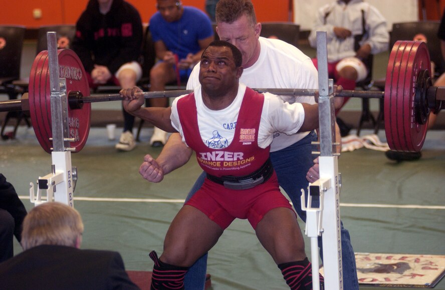 Ramstein’s Shannon Carter lifts 237.5 kilograms or 523.59 pounds in the third and final round of the squat event Dec. 16 at the gym on Landstuhl Regional Medical Center. Lifting more than seven times his actual body weight, Carter kept his title from last year’s garrison tournament as “the strongest man” capturing the Overall Male Lifter title by heaving a total of 670 kg or 1,477.08 lbs.