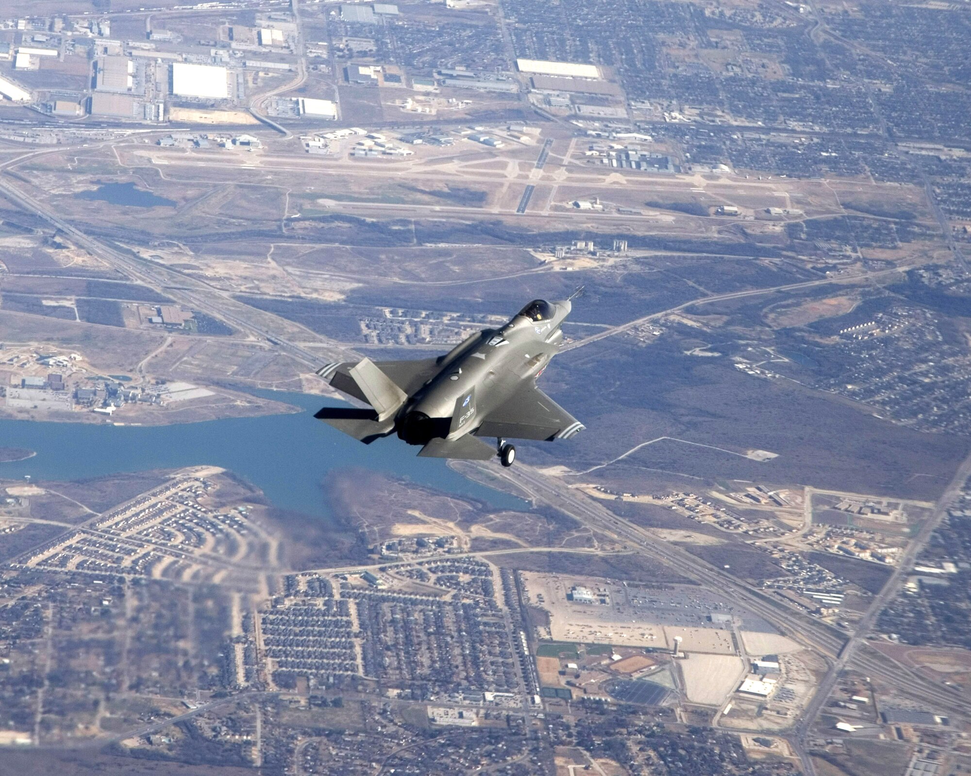 The F-35 Lightning II Joint Strike Fighter makes its initial flight Dec. 15 over Fort Worth, Texas. (Lockheed Martin photo/David Drais)