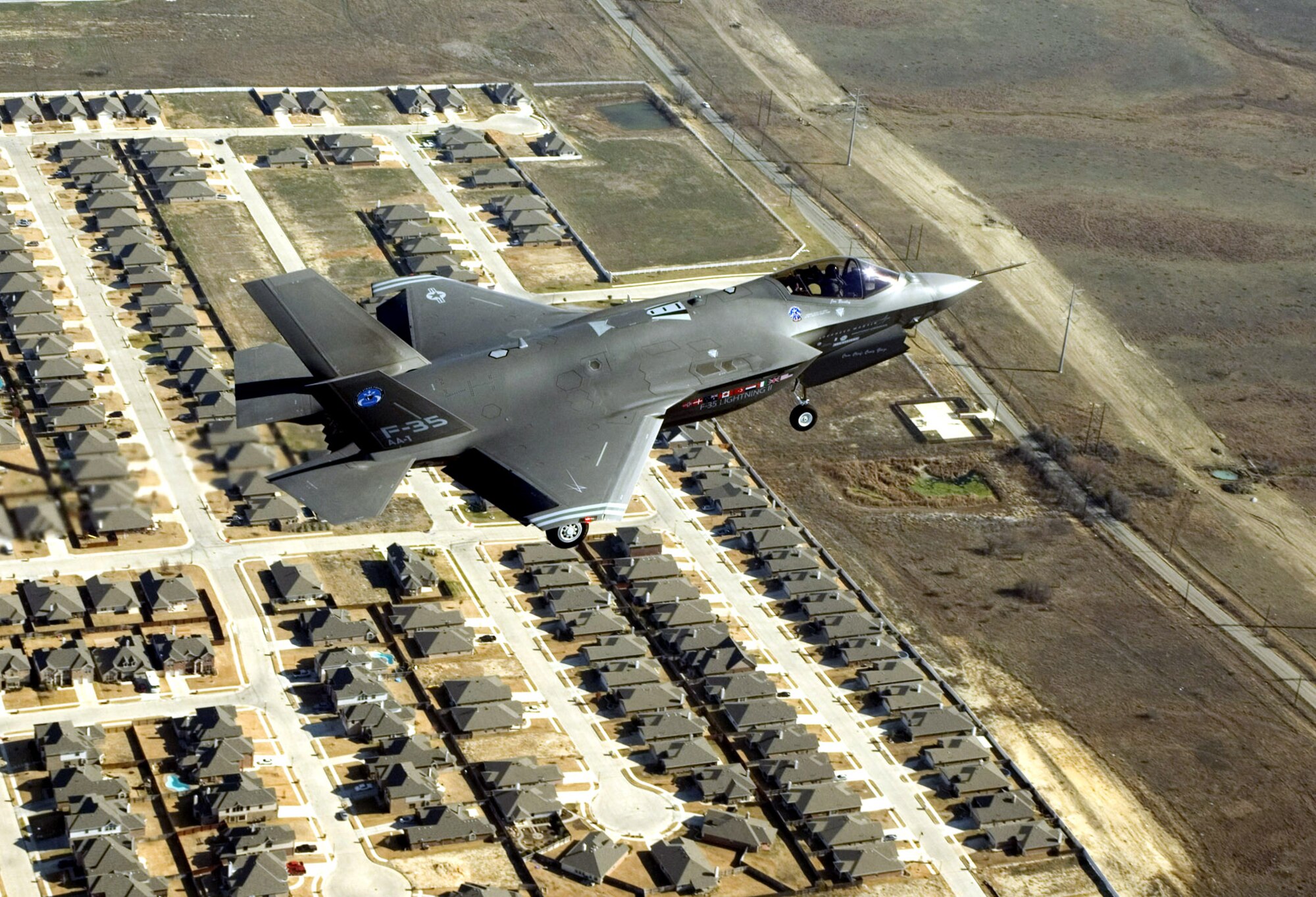 The F-35 Lightning II Joint Strike Fighter makes its initial flight Dec. 15 over Fort Worth, Texas. (Lockheed Martin photo/David Drais)