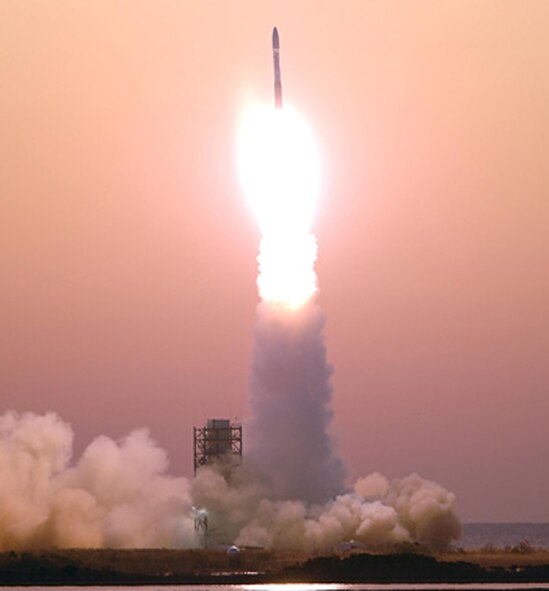 TacSat-2 lifts off from the Wallops Flight Facility in Wallops, Va. The satellite, housed in a shroud atop the rocket, will be released into space between 100,000 and 150,000 feet altitude, and will share the brief ride into the cosmos with NASA’s GeneSat-1. (Photo courtesy of NASA)