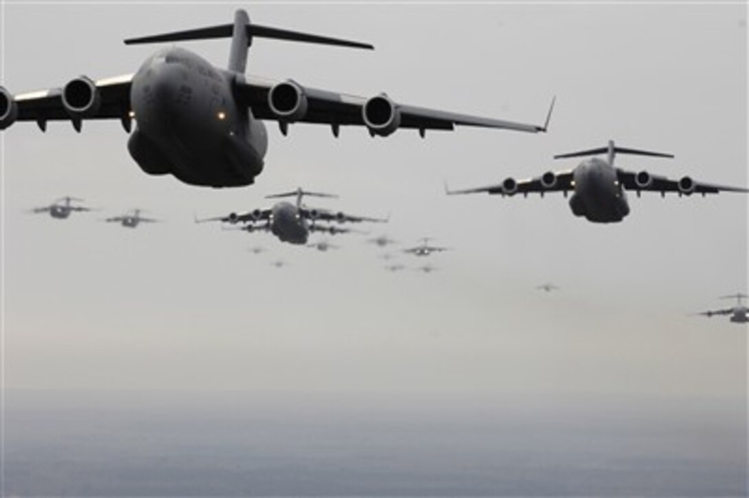 Twenty U.S. Air Force C-17 Globemaster III aircraft participate in a large-formation exercise over the coast of Charleston, S.C., Dec. 21, 2006. The C-17s are assigned to the 437th and 315th Airlift Wings at Charleston Air Force Base, S.C.