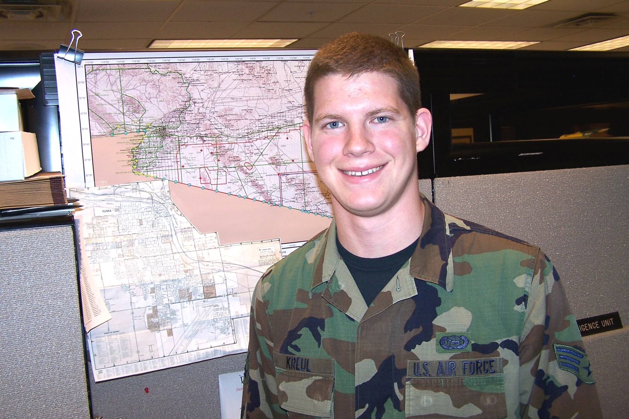 South Dakota Air National Guardsman Senior Airman Mark Kreul is on duty this holiday season working with the U.S. Border Patrol to bolster security along the U.S.-Mexico border as part of Operation Jump Start. Airman Kreul, who works at the U.S. Border Patrol's Yuma, Ariz., sector headquarters, is an intelligence analyst for Task Force Yuma. When not deployed with the National Guard, he is a full-time student at South Dakota State University. (U.S. Air Force photo/Staff Sgt. Dan Heaton) 