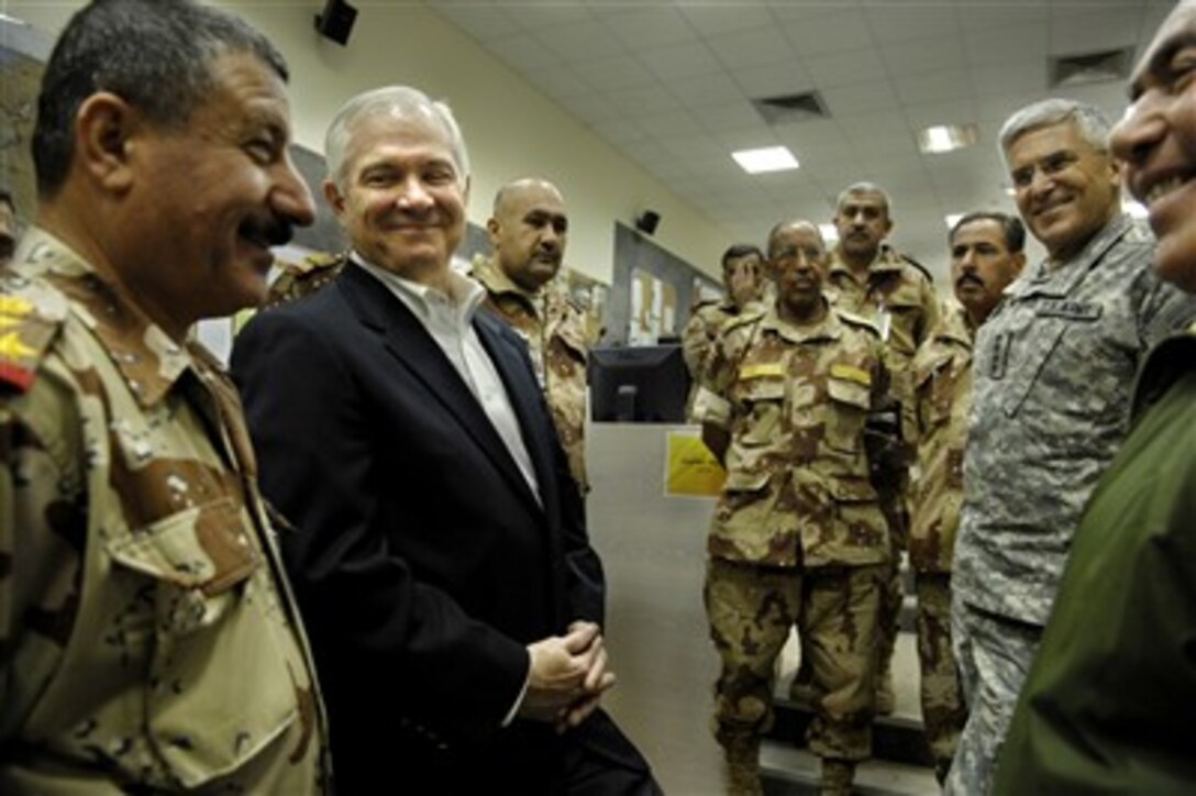 Defense Secretary Robert Gates, second from left, and Gen. George Casey, right, commander Multinational forces-Iraq, meet with Iraqi army soldiers during a visit to Baghdad, Iraq, Dec. 22, 2006. Gates visited Iraq to meet with troops, top military leaders, and Iraqi government officials.